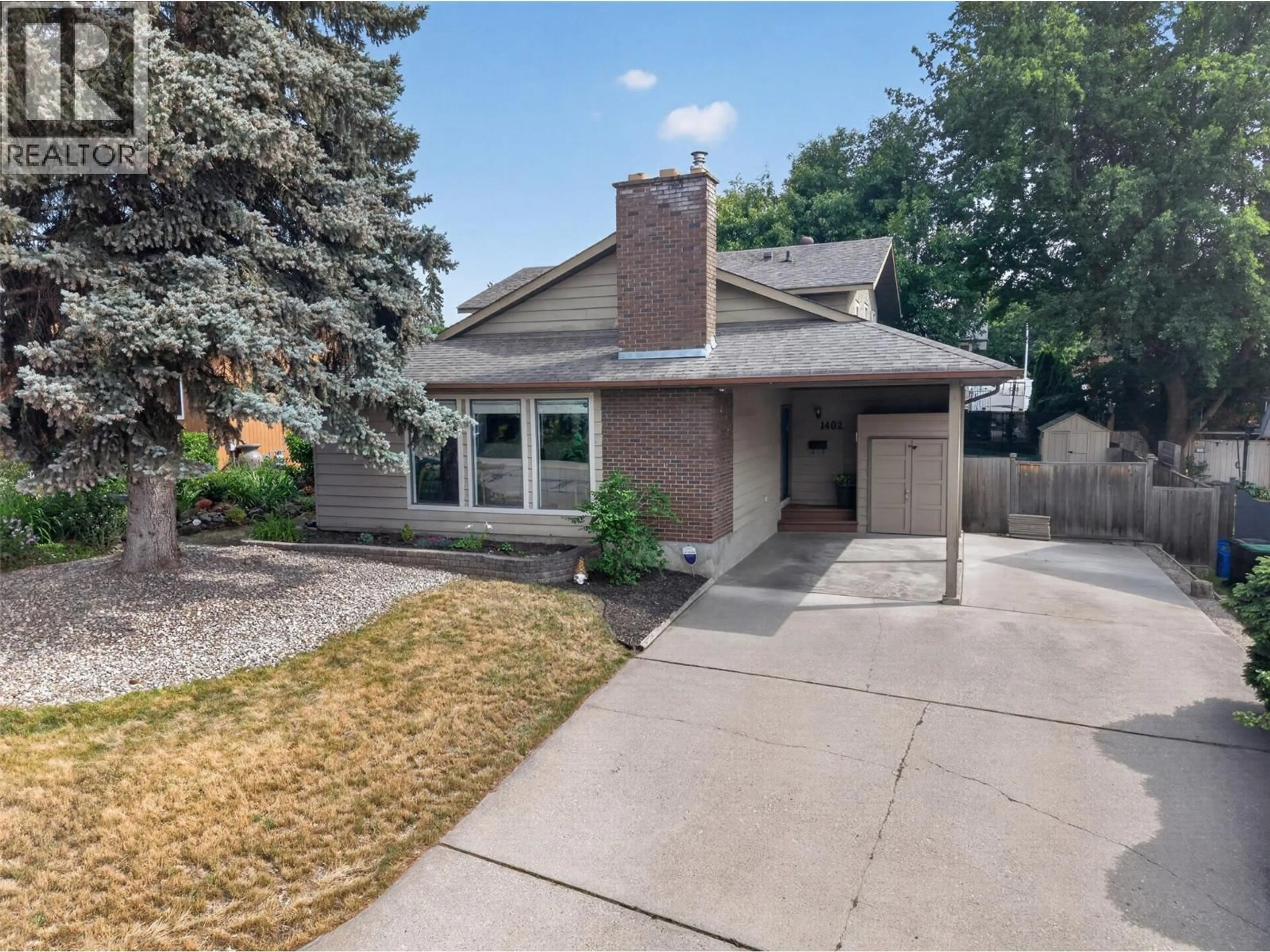 Home with brick exterior material, street for 1402 41 AVENUE, Vernon British Columbia V1T8A5