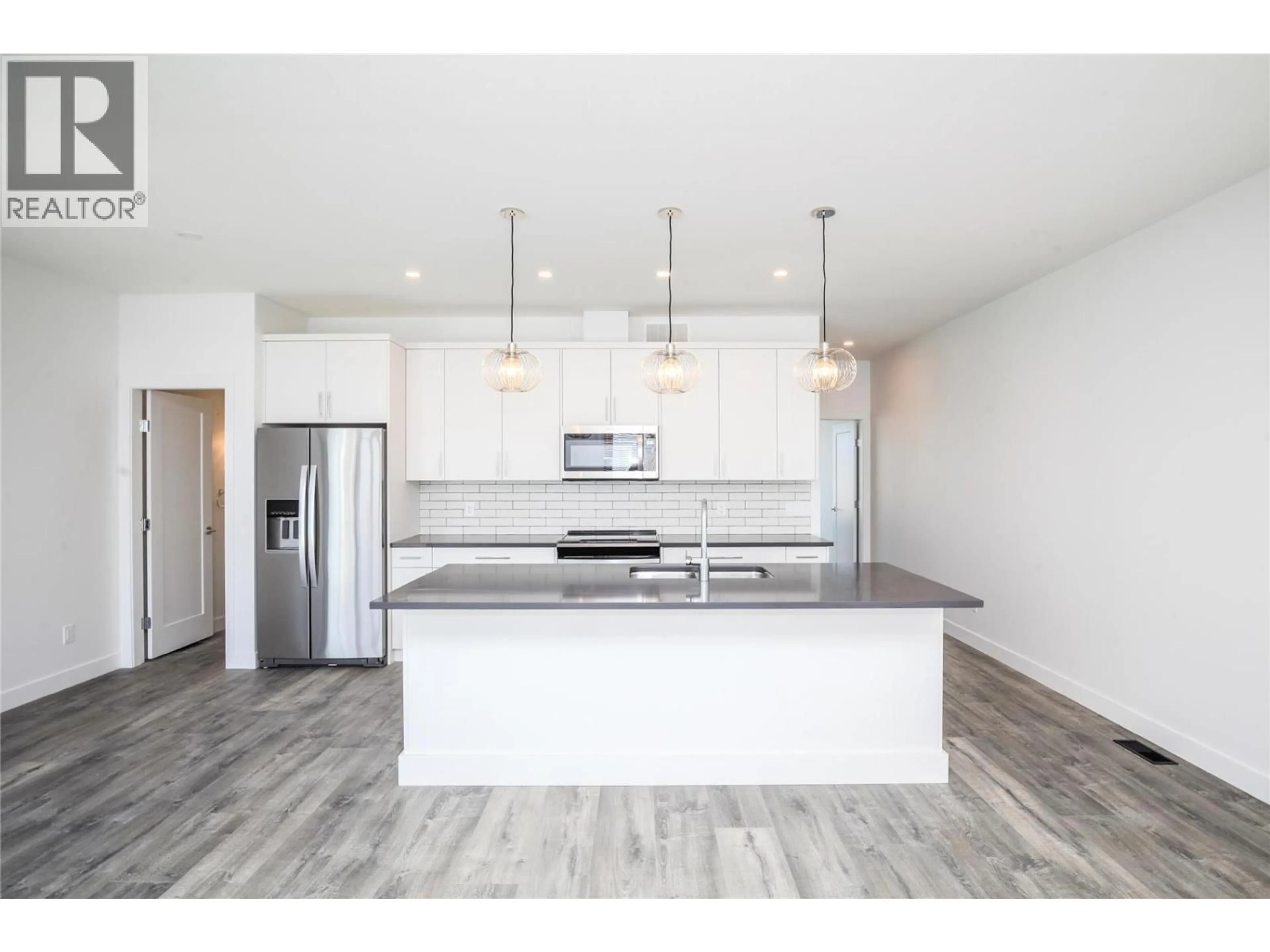 Open concept kitchen, unknown for 118 - 610 ACADEMY WAY, Kelowna British Columbia V1V0E8