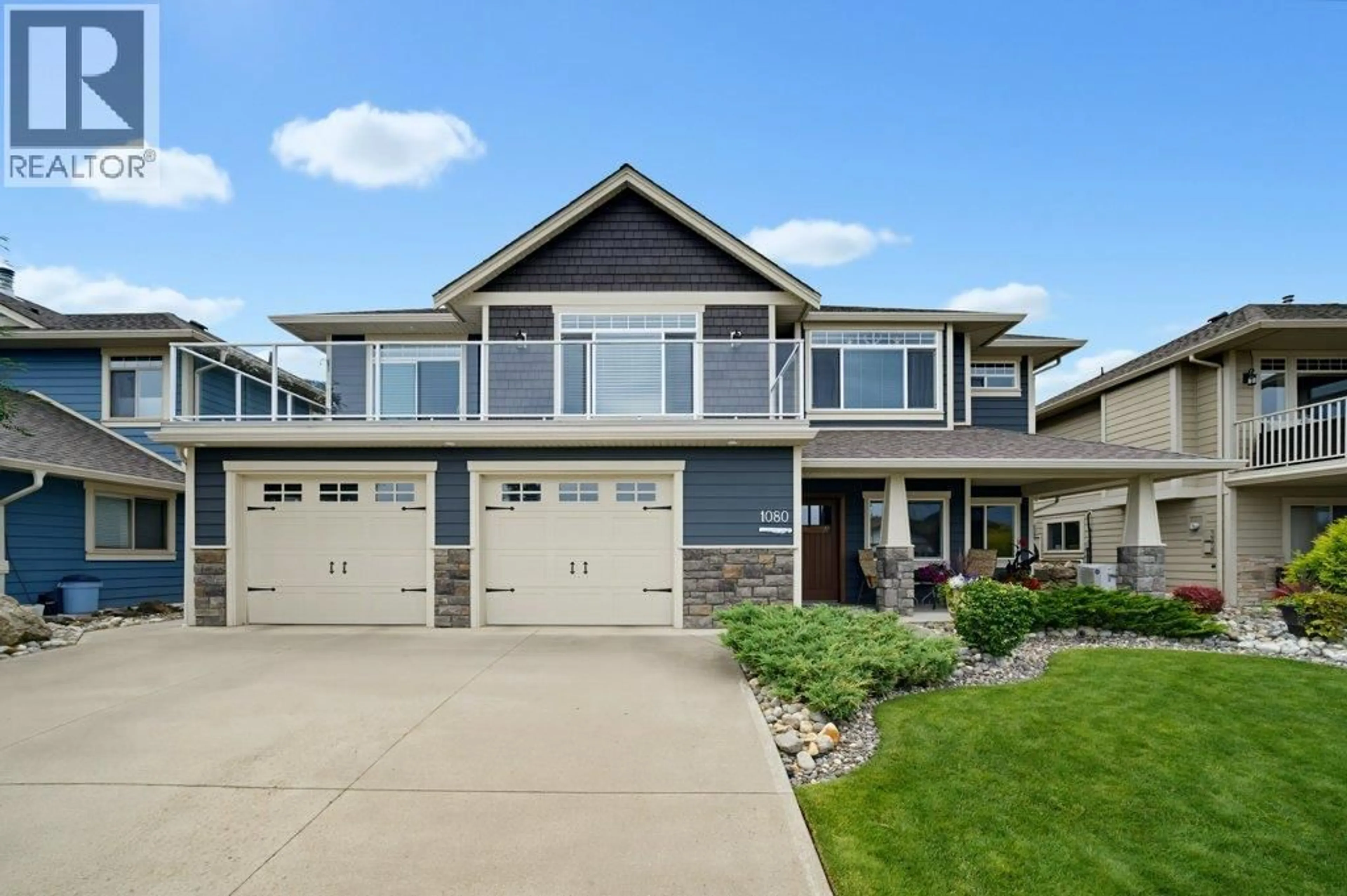 Home with vinyl exterior material, street for 1080 23 AVENUE SOUTHWEST, Salmon Arm British Columbia V1E0A9