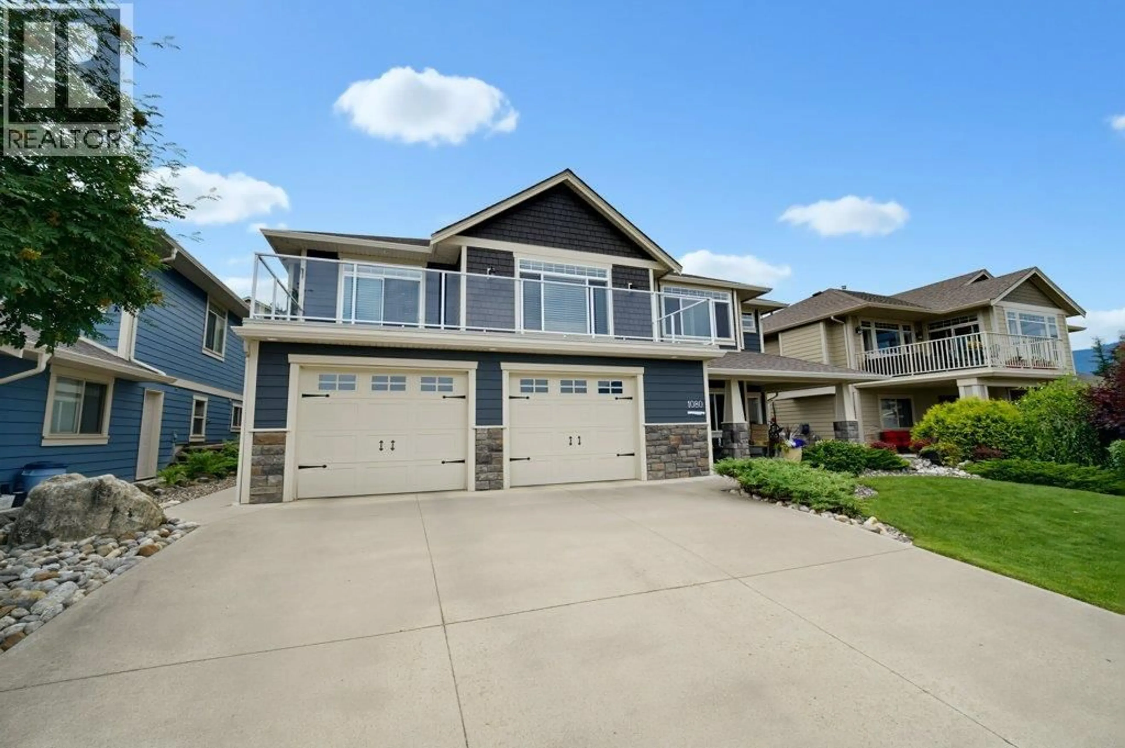Home with vinyl exterior material, street for 1080 23 AVENUE SOUTHWEST, Salmon Arm British Columbia V1E0A9