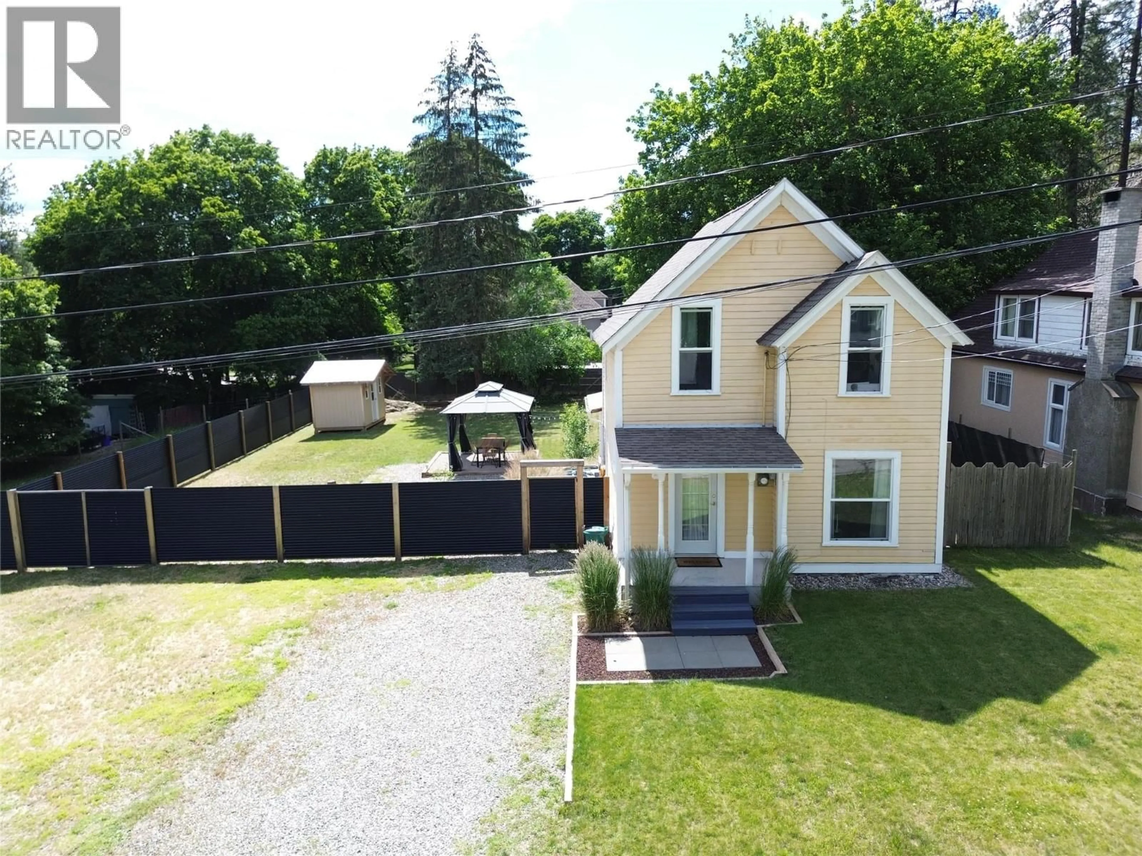 A pic from outside/outdoor area/front of a property/back of a property/a pic from drone, street for 7577 4TH STREET, Grand Forks British Columbia V0H1H0