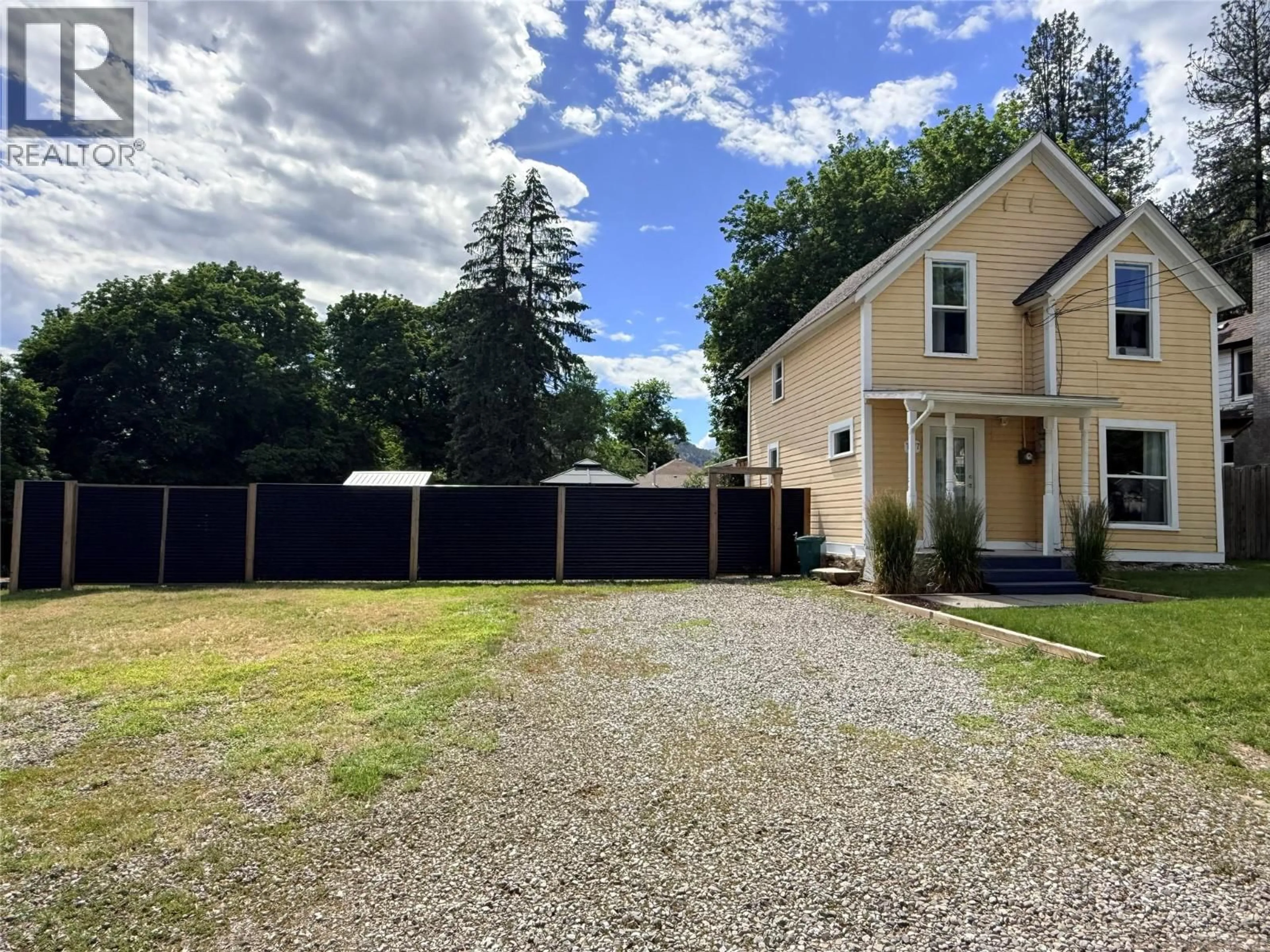 A pic from outside/outdoor area/front of a property/back of a property/a pic from drone, street for 7577 4TH STREET, Grand Forks British Columbia V0H1H0