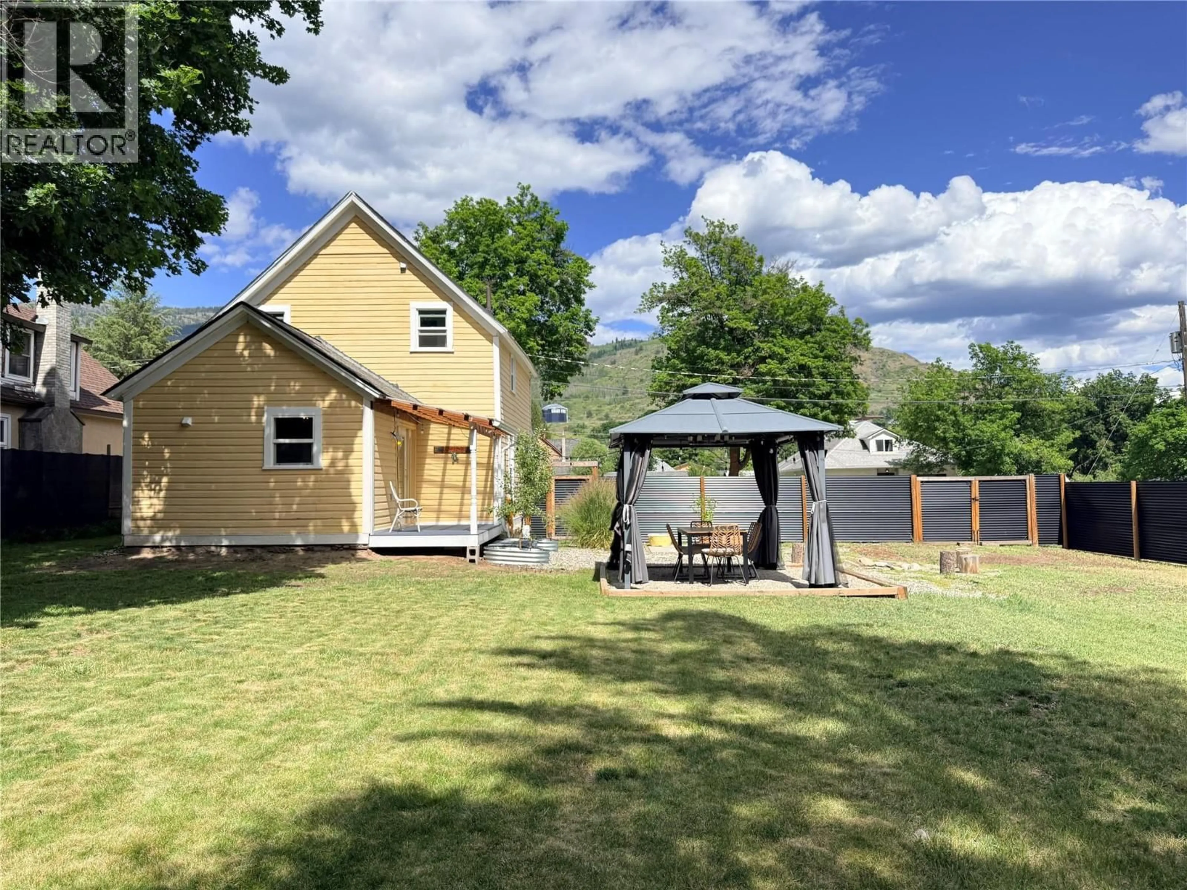 A pic from outside/outdoor area/front of a property/back of a property/a pic from drone, unknown for 7577 4TH STREET, Grand Forks British Columbia V0H1H0