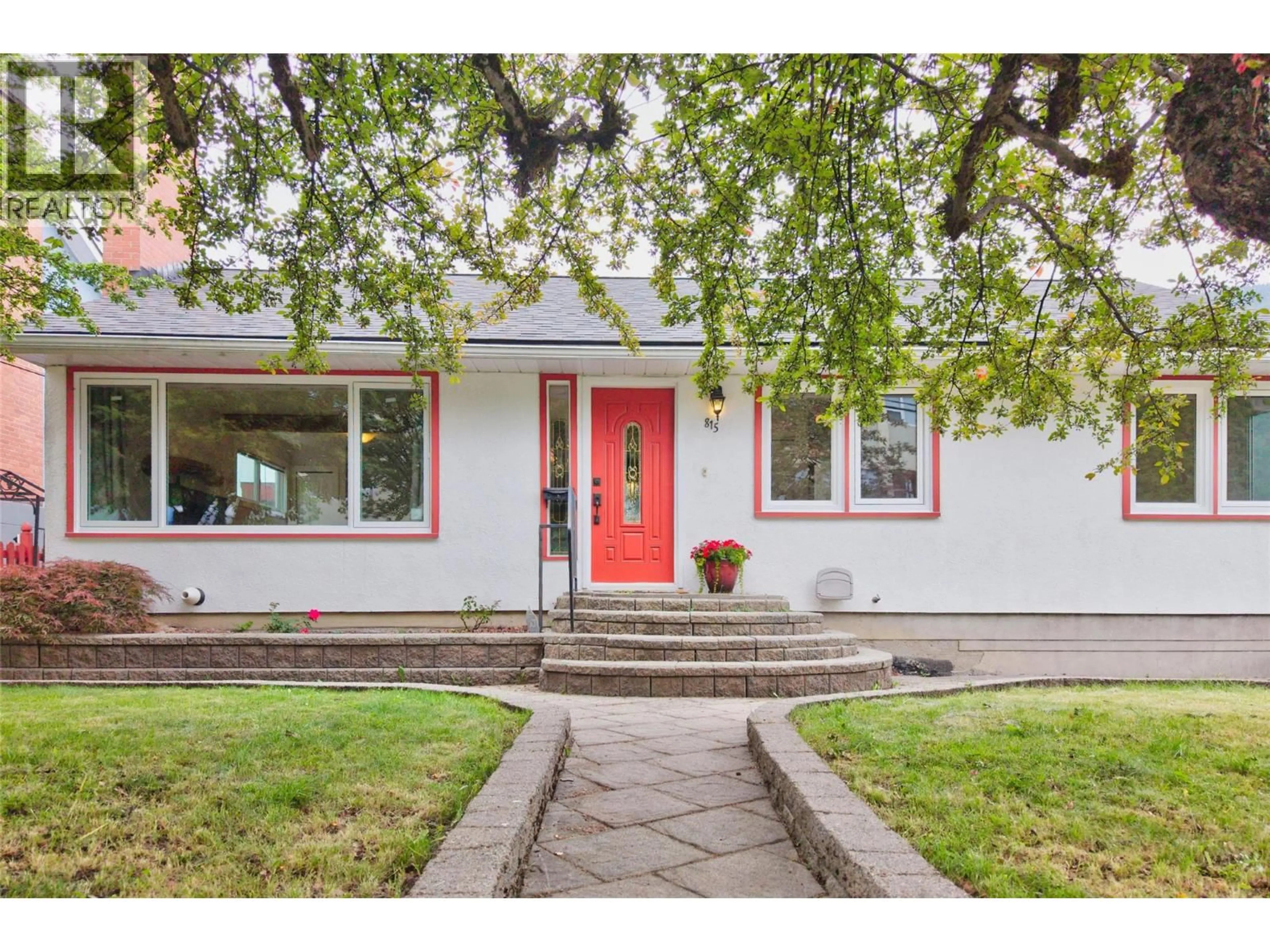 Home with vinyl exterior material, street for 815 TENTH STREET, Nelson British Columbia V1L3C6