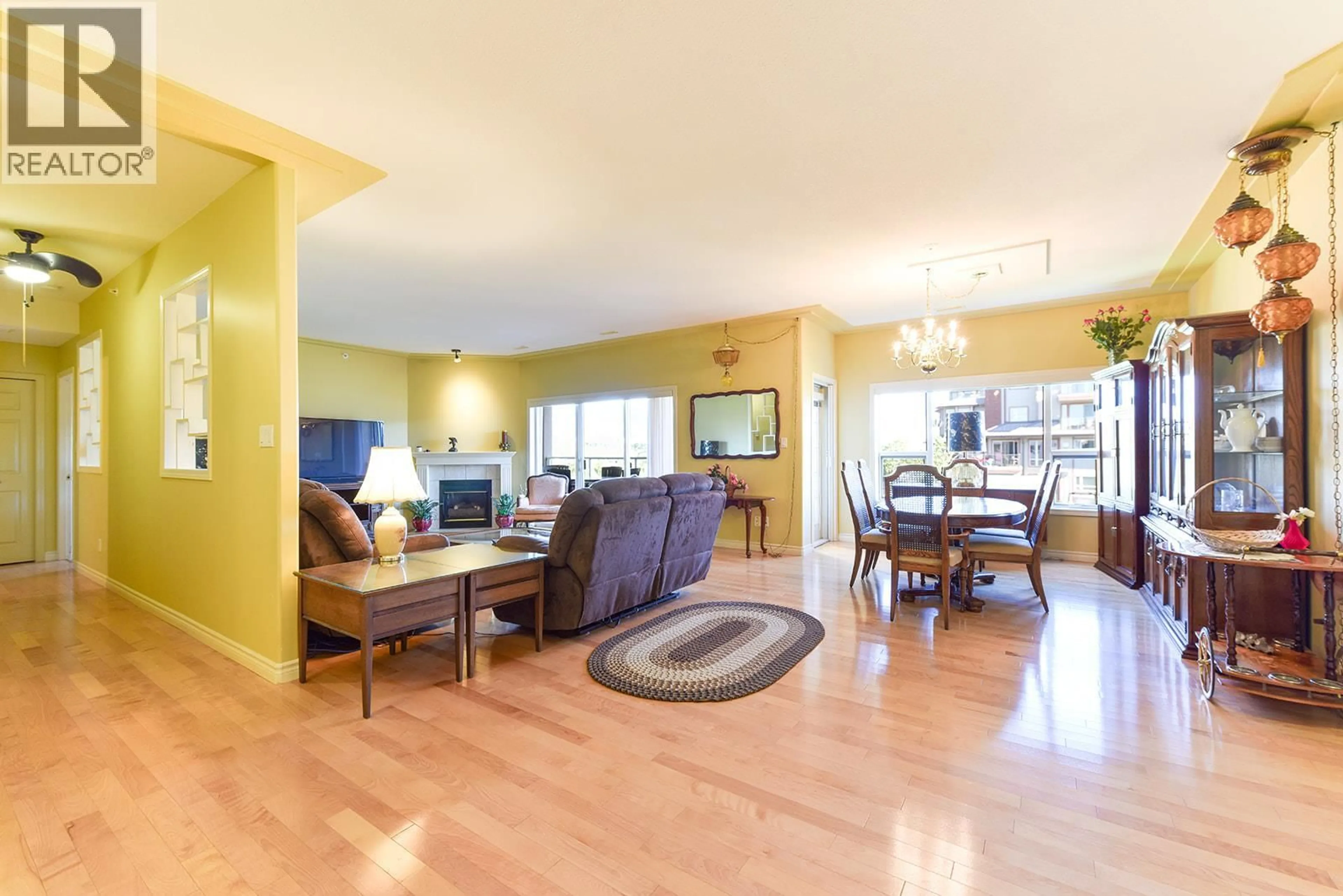 Living room with furniture, wood/laminate floor for 803 - 2245 ATKINSON STREET, Penticton British Columbia V2A8R7