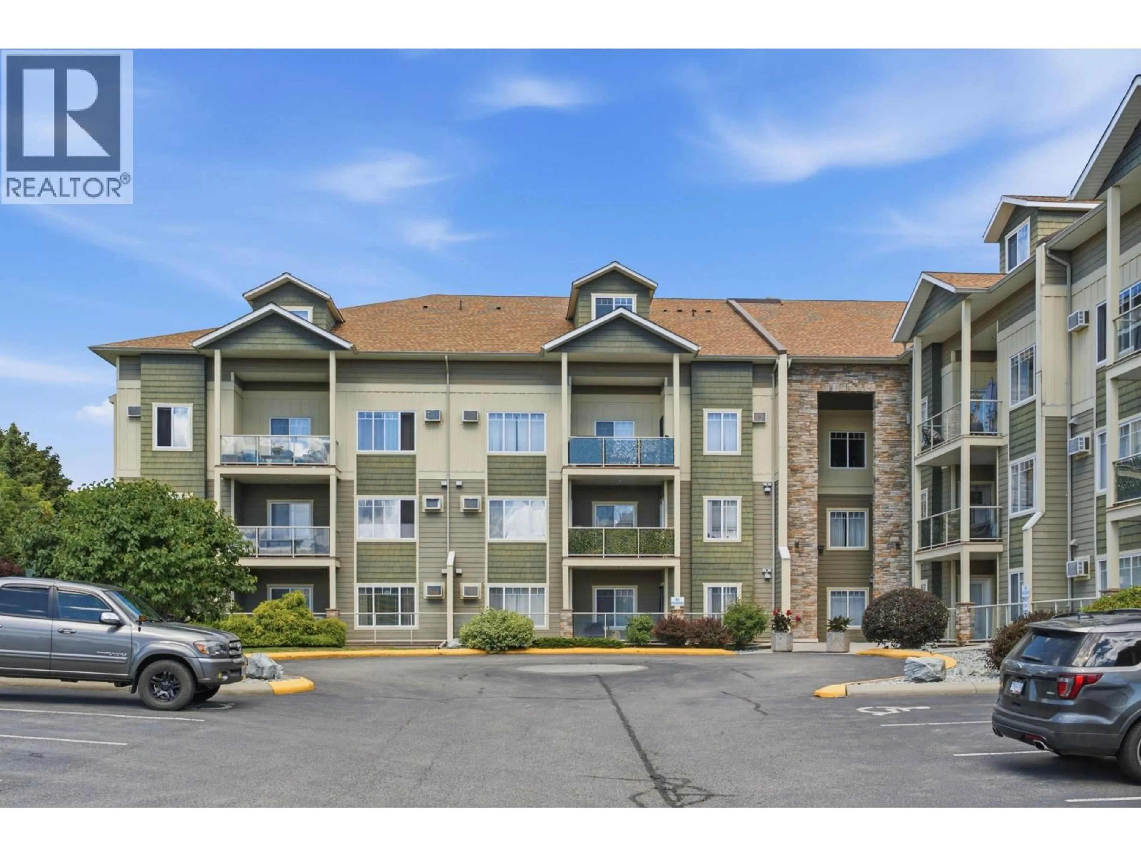 A pic from outside/outdoor area/front of a property/back of a property/a pic from drone, mountain view for 214 - 2120 SHANNON RIDGE DRIVE, West Kelowna British Columbia V4T2Z3