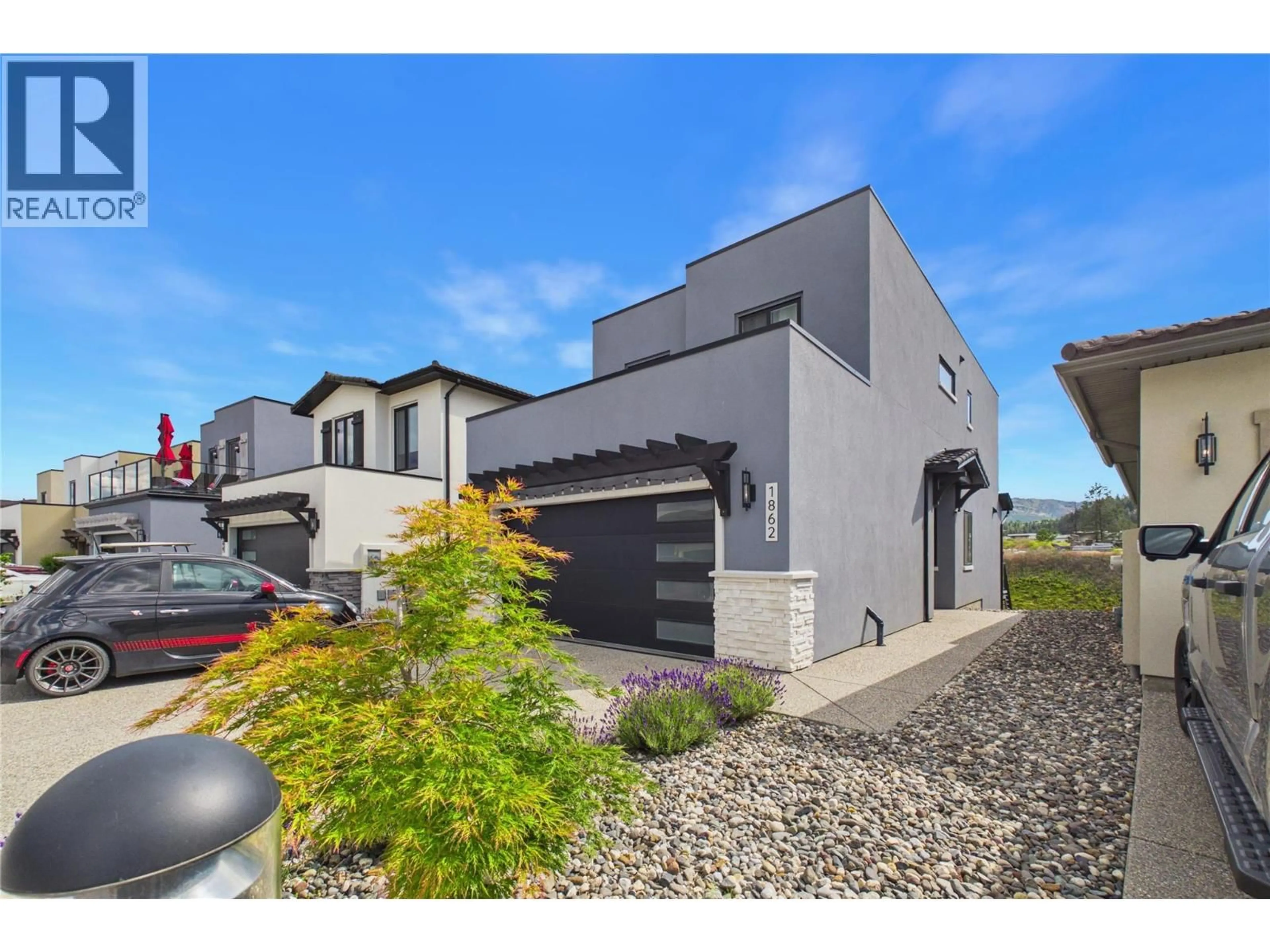 A pic from outside/outdoor area/front of a property/back of a property/a pic from drone, street for 1862 VIEWPOINT CRESCENT, West Kelowna British Columbia V1Z4E1