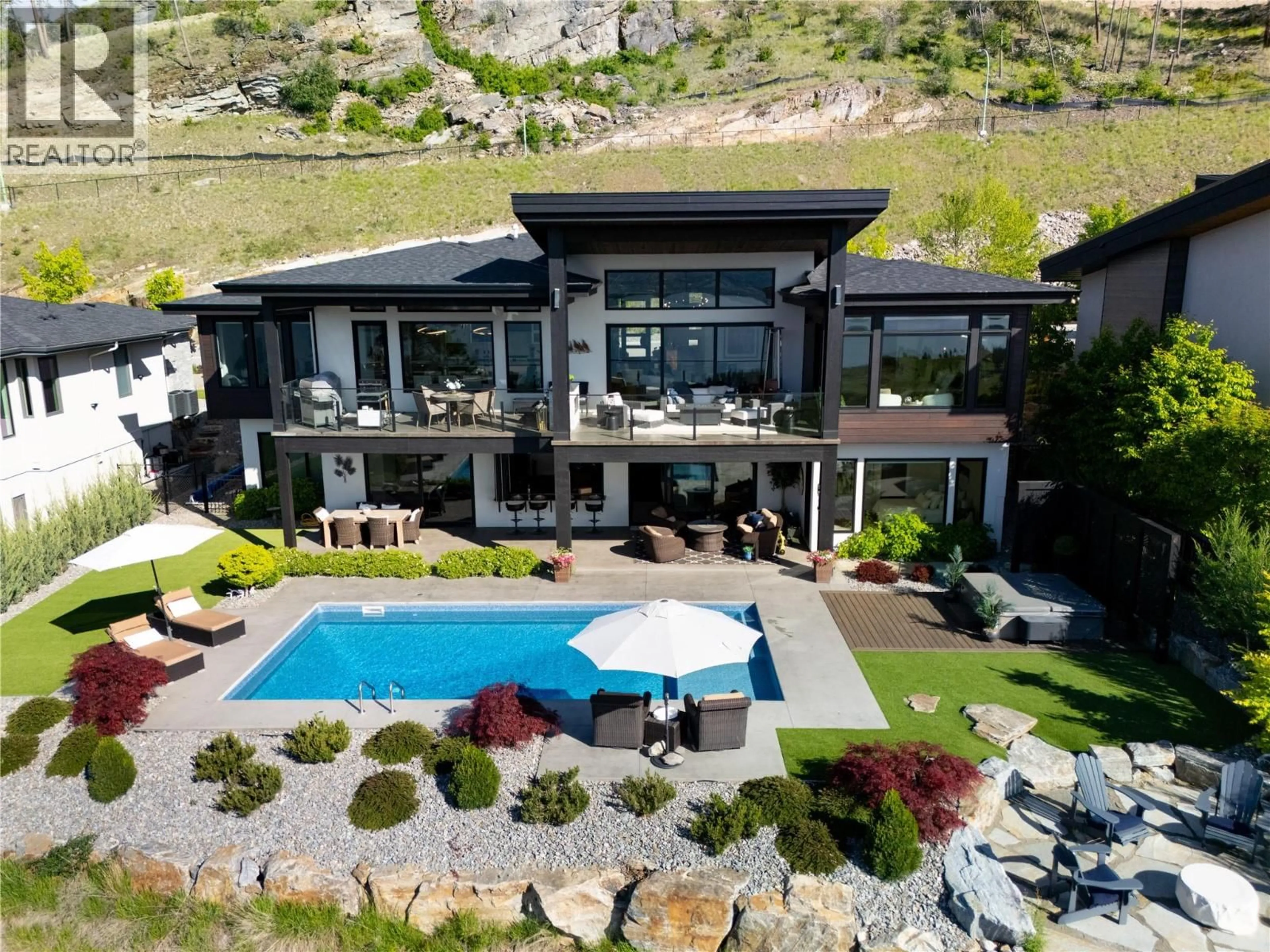 A pic from outside/outdoor area/front of a property/back of a property/a pic from drone, mountain view for 111 - 5650 THE EDGE PLACE, Kelowna British Columbia V1W4L5