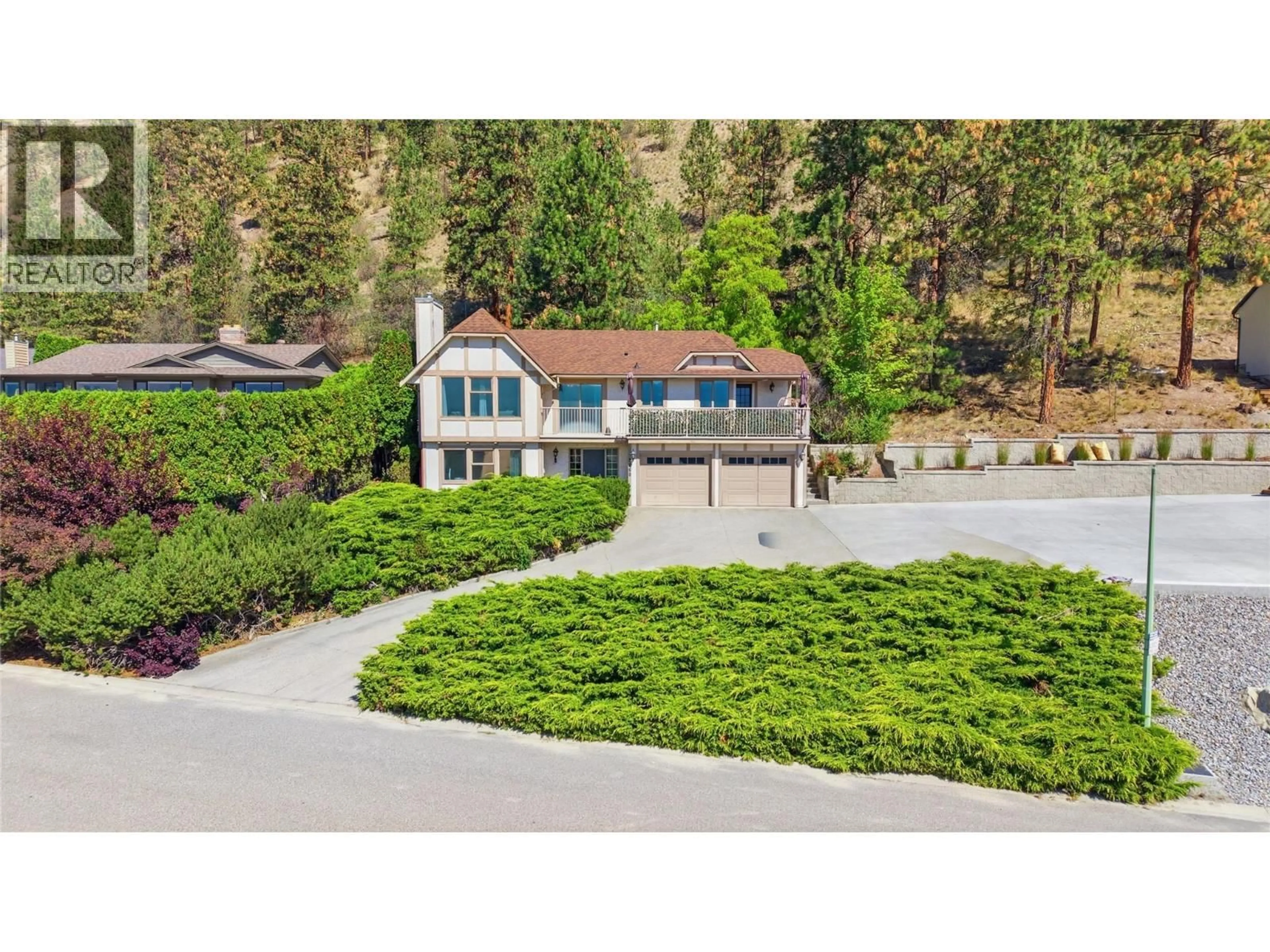 A pic from outside/outdoor area/front of a property/back of a property/a pic from drone, unknown for 2260 OMINECA PLACE, Kelowna British Columbia V1V1H7