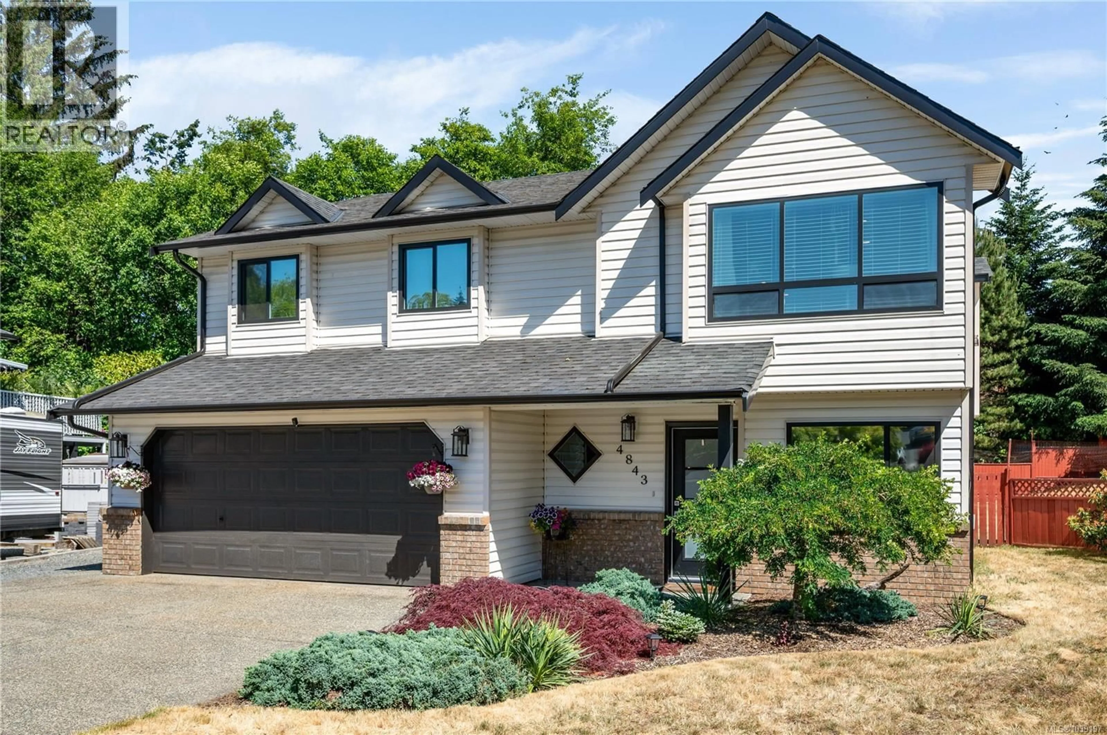 Home with vinyl exterior material, street for 4843 HARTFORD PLACE, Nanaimo British Columbia V9V1N8