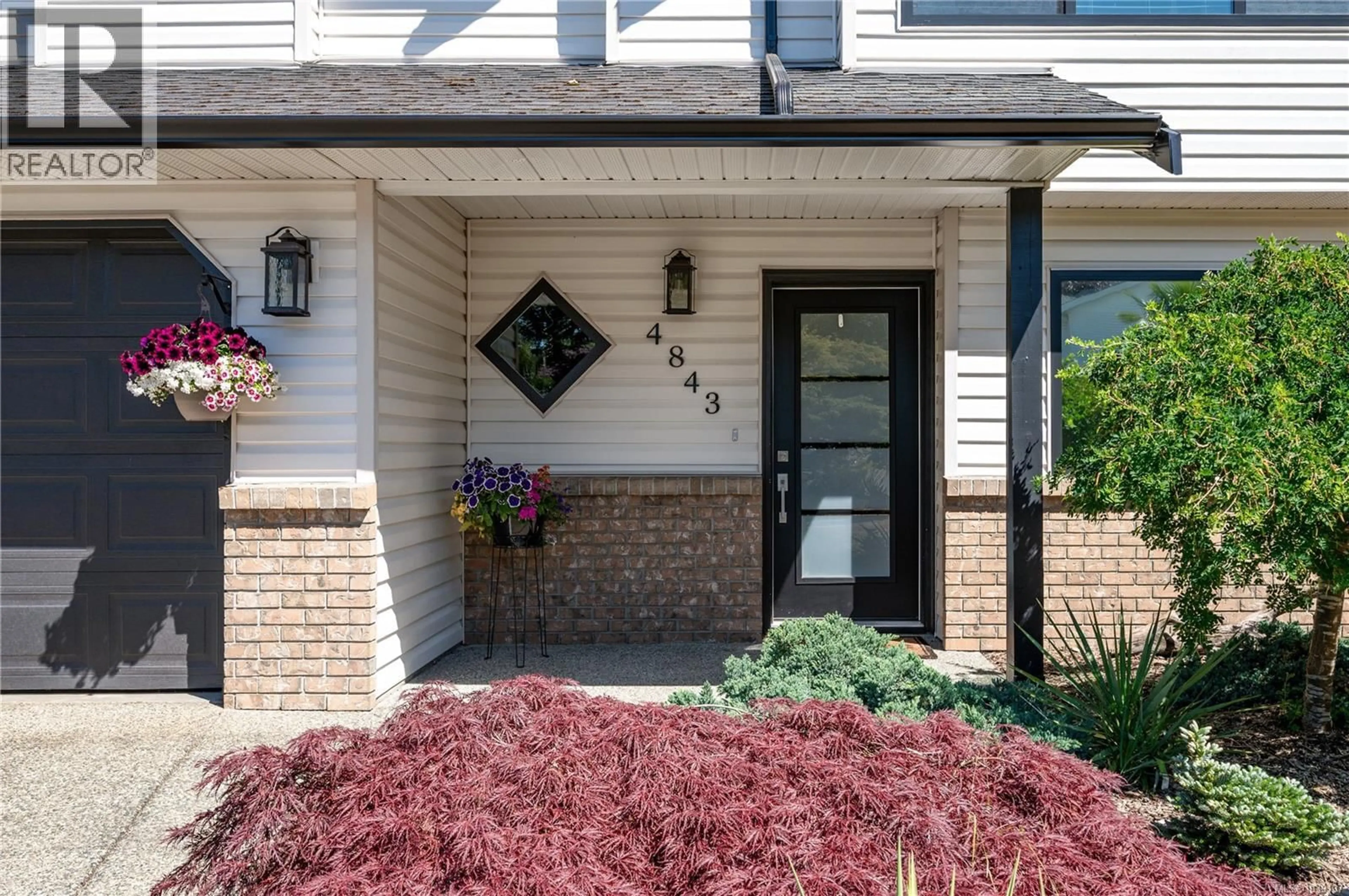 Home with brick exterior material, street for 4843 HARTFORD PLACE, Nanaimo British Columbia V9V1N8