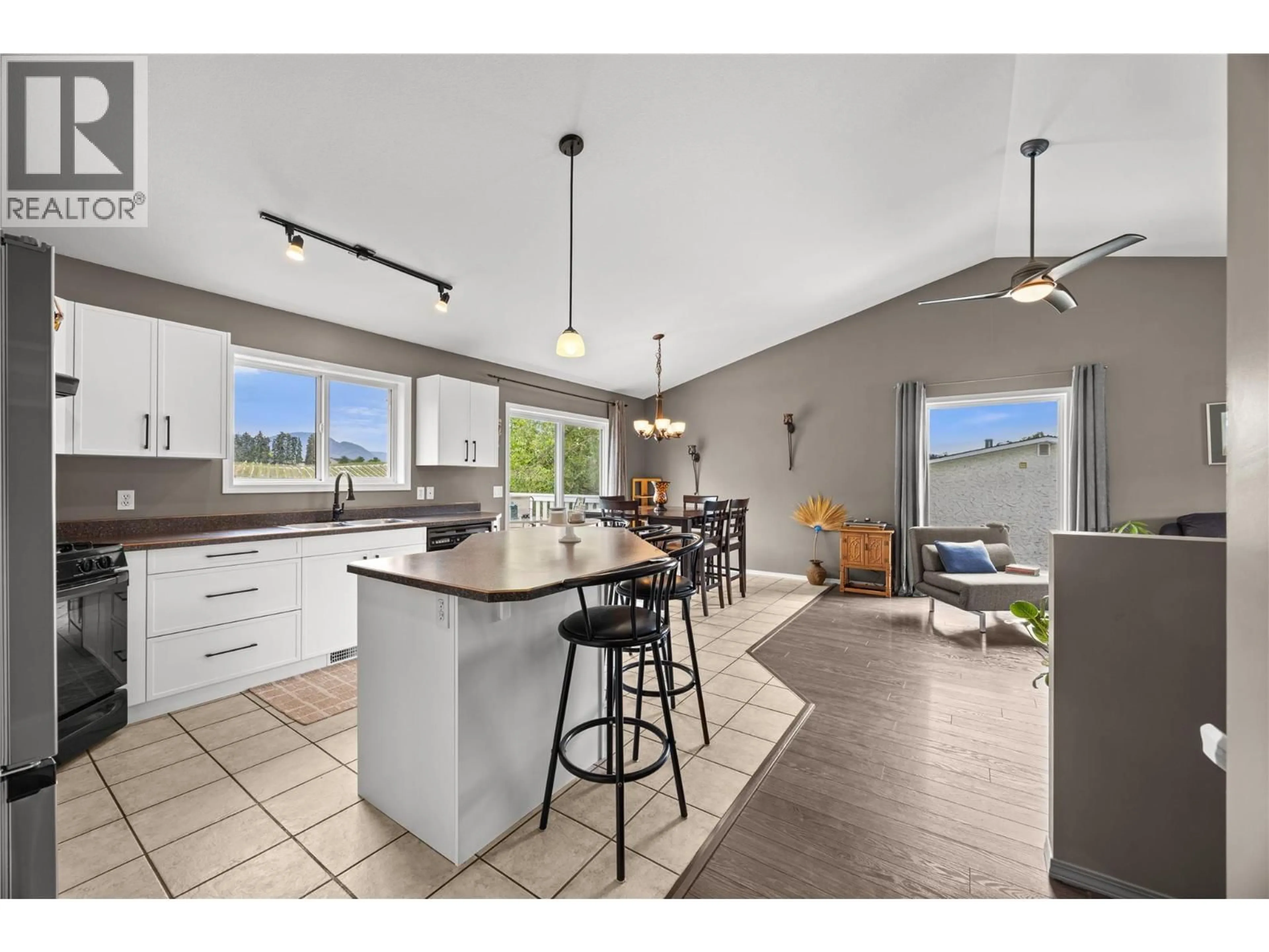 Open concept kitchen, ceramic/tile floor for 305 SNOWSELL STREET NORTH, Kelowna British Columbia V1V2C7