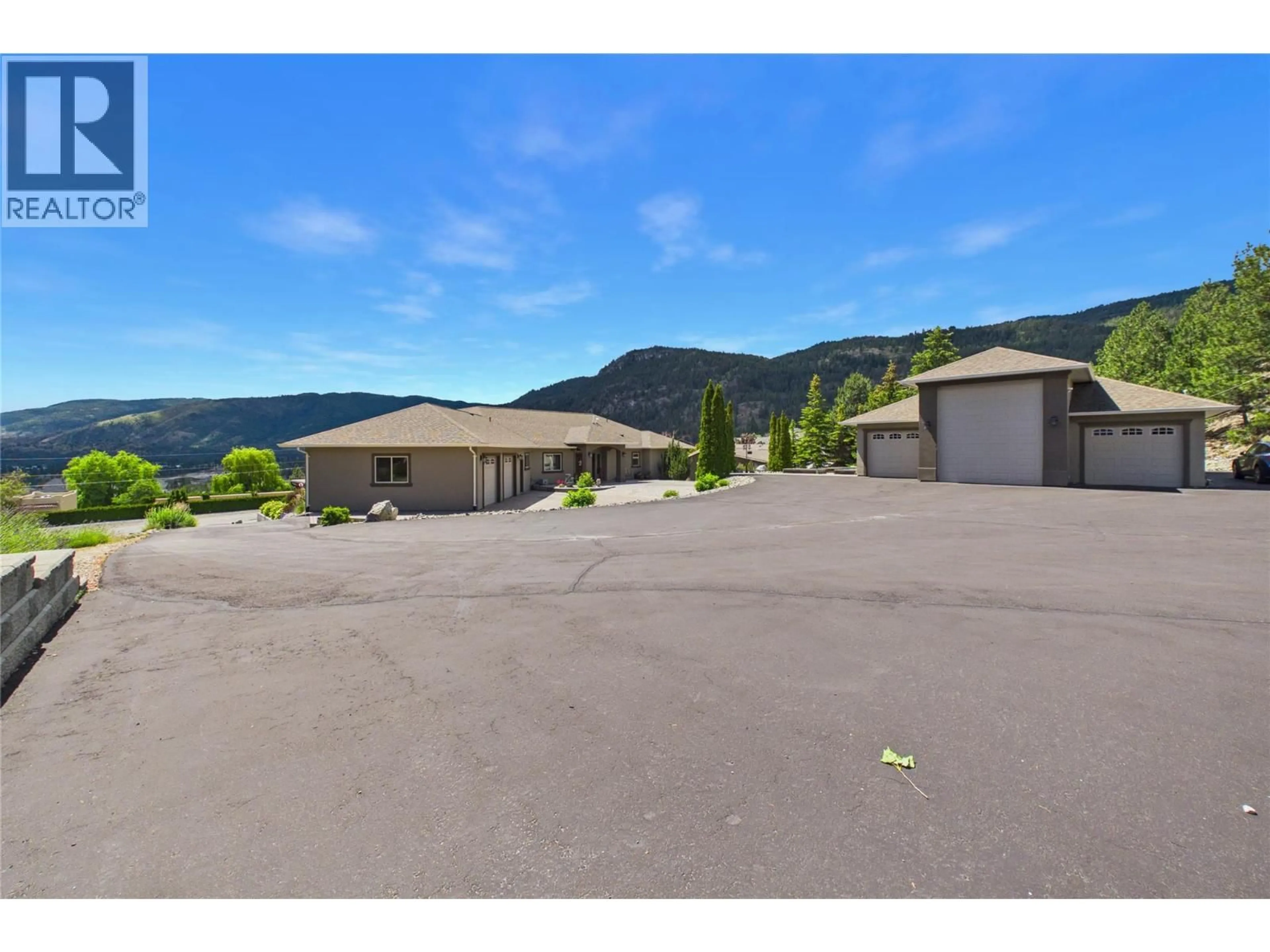A pic from outside/outdoor area/front of a property/back of a property/a pic from drone, mountain view for 2619 FORSYTH DRIVE, Penticton British Columbia V2A8Y9