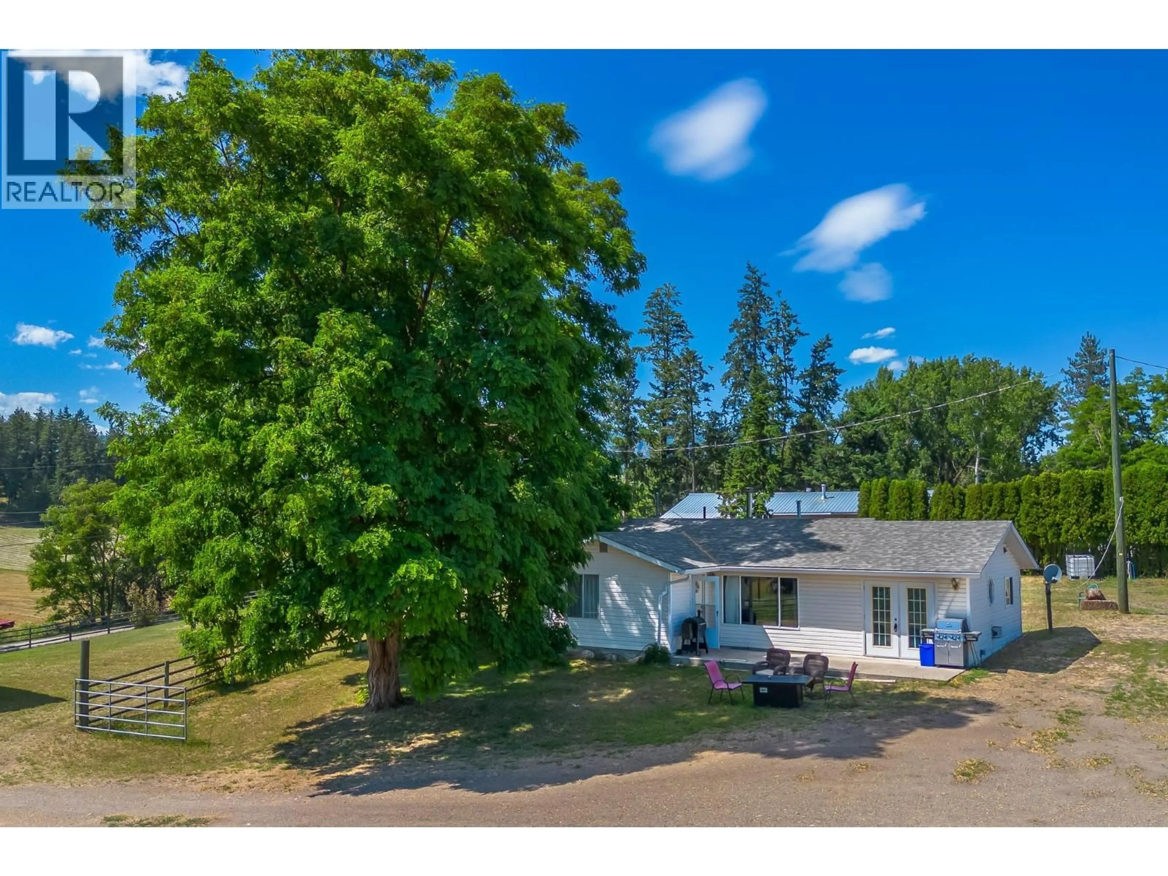 A pic from outside/outdoor area/front of a property/back of a property/a pic from drone, unknown for 4420 SCHUBERT ROAD, Spallumcheen British Columbia V0E1B4