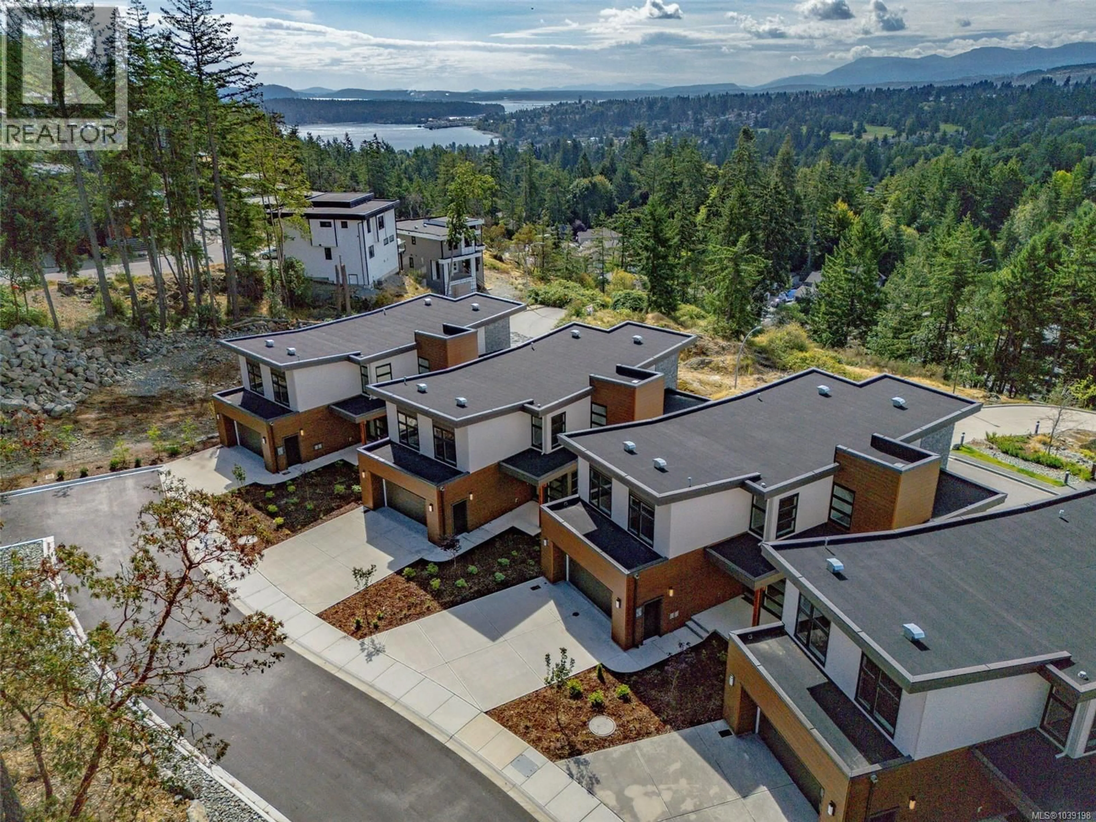 A pic from outside/outdoor area/front of a property/back of a property/a pic from drone, mountain view for 105 - 1220 MANZANITA PLACE, Nanaimo British Columbia V9T0L7