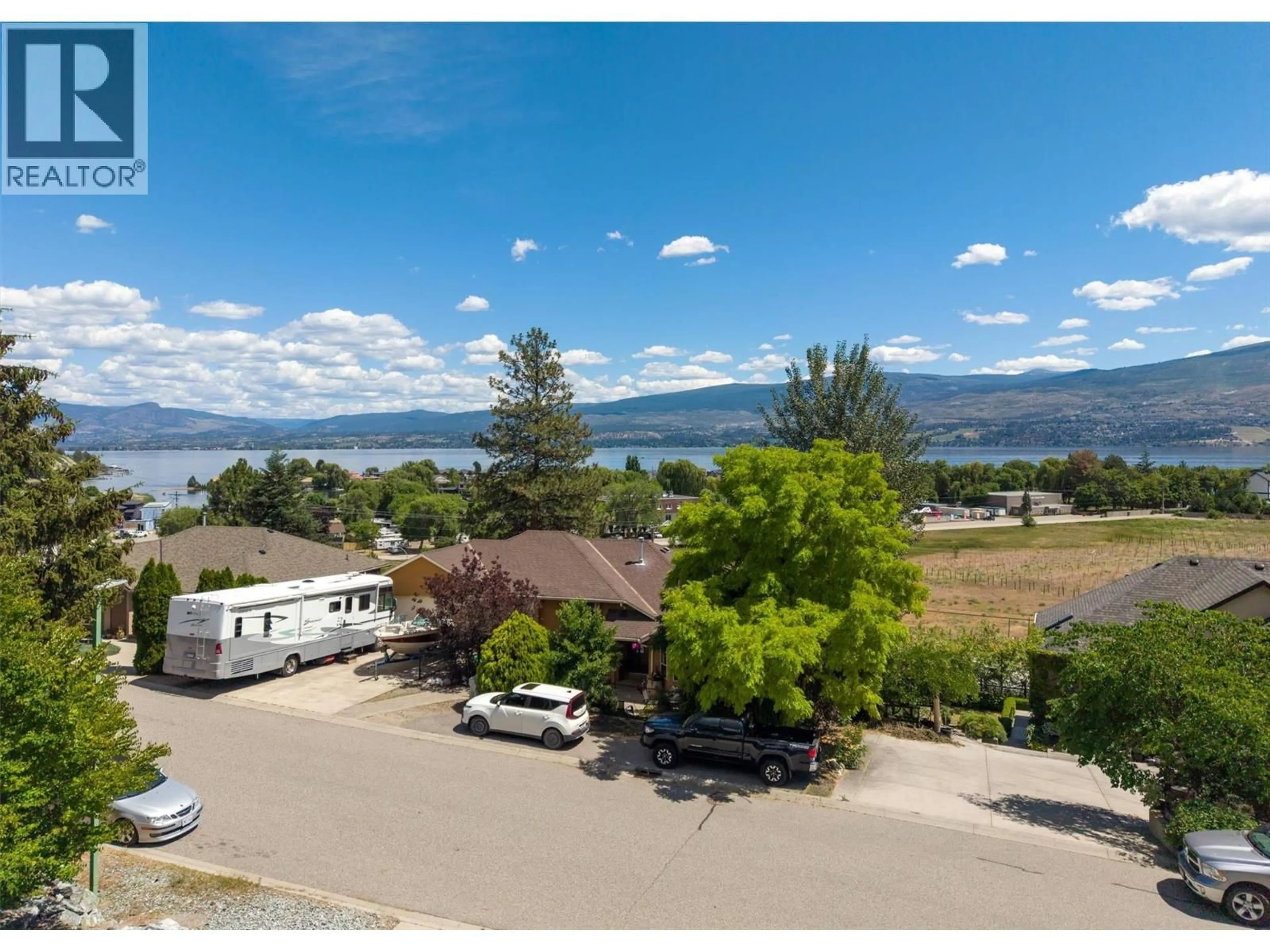 A pic from outside/outdoor area/front of a property/back of a property/a pic from drone, water/lake/river/ocean view for 3605 EMPIRE PLACE, West Kelowna British Columbia V4T1Y8