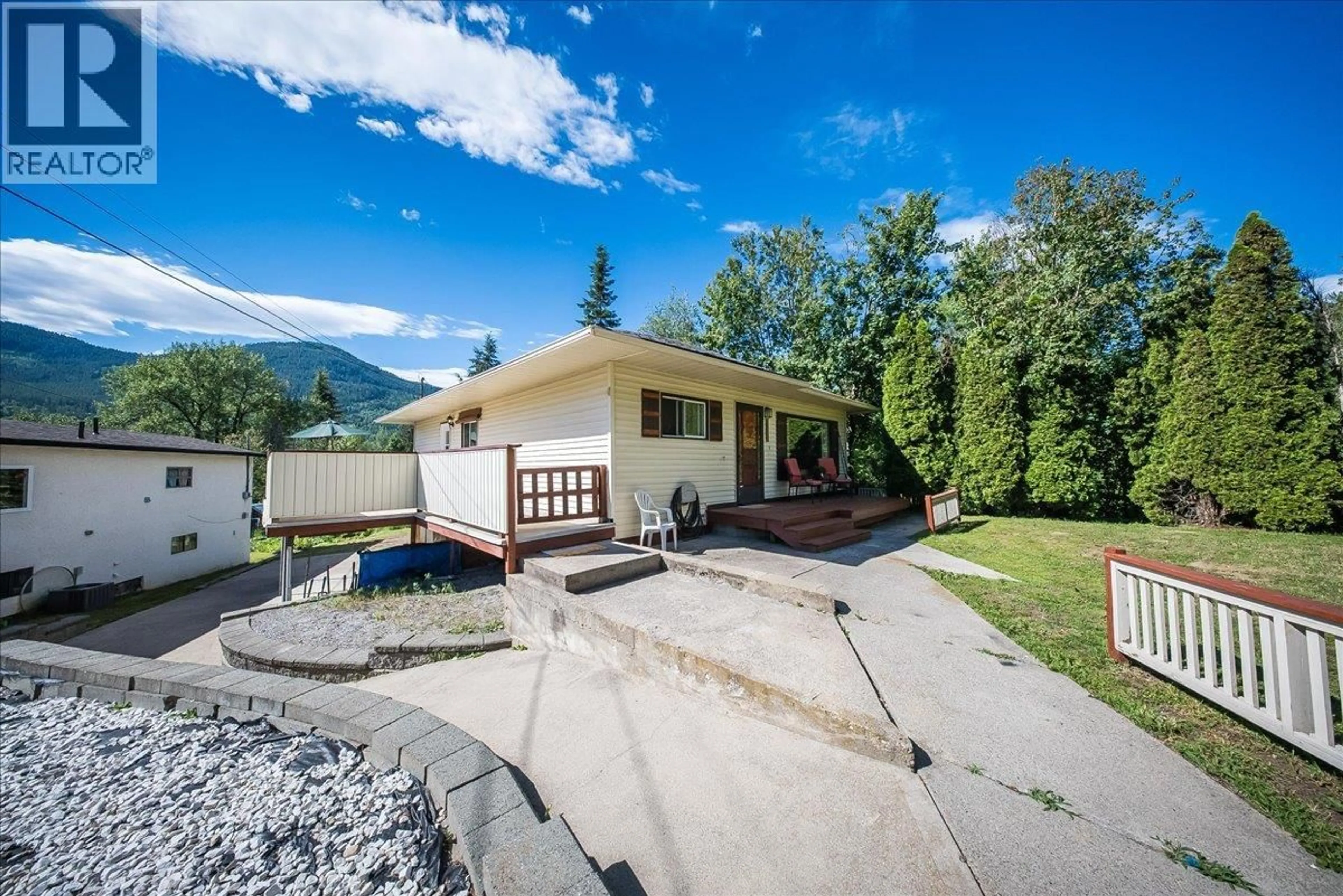 A pic from outside/outdoor area/front of a property/back of a property/a pic from drone, mountain view for 1200 FALLS ROAD, Fruitvale British Columbia V0G1P0