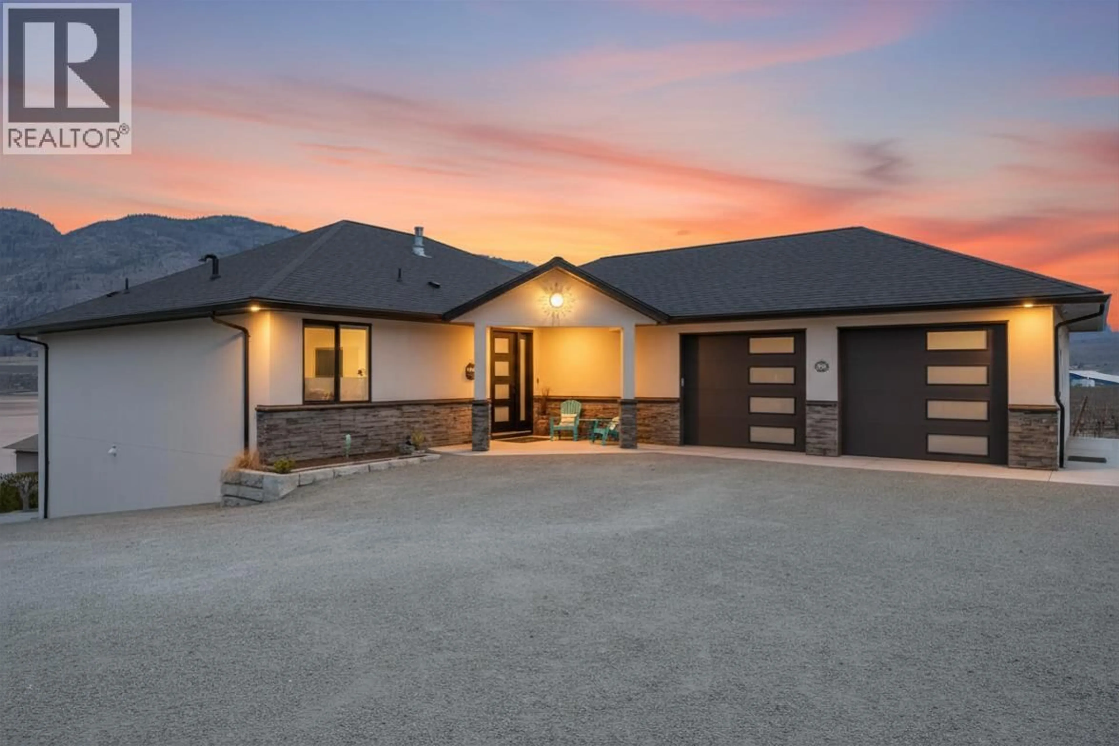 A pic from outside/outdoor area/front of a property/back of a property/a pic from drone, street for 10400 87TH STREET, Osoyoos British Columbia V0H1V2
