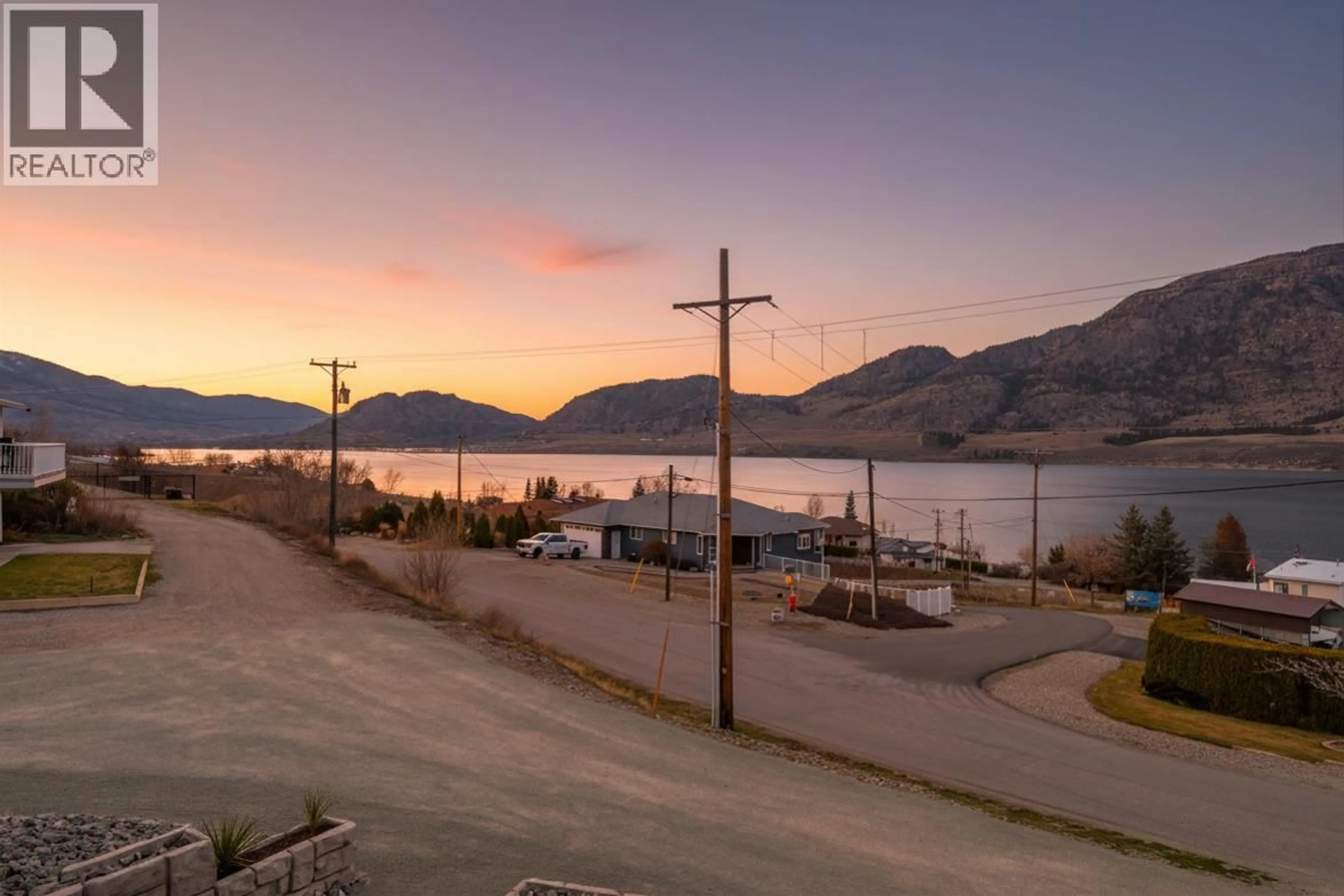 A pic from outside/outdoor area/front of a property/back of a property/a pic from drone, water/lake/river/ocean view for 10400 87TH STREET, Osoyoos British Columbia V0H1V2