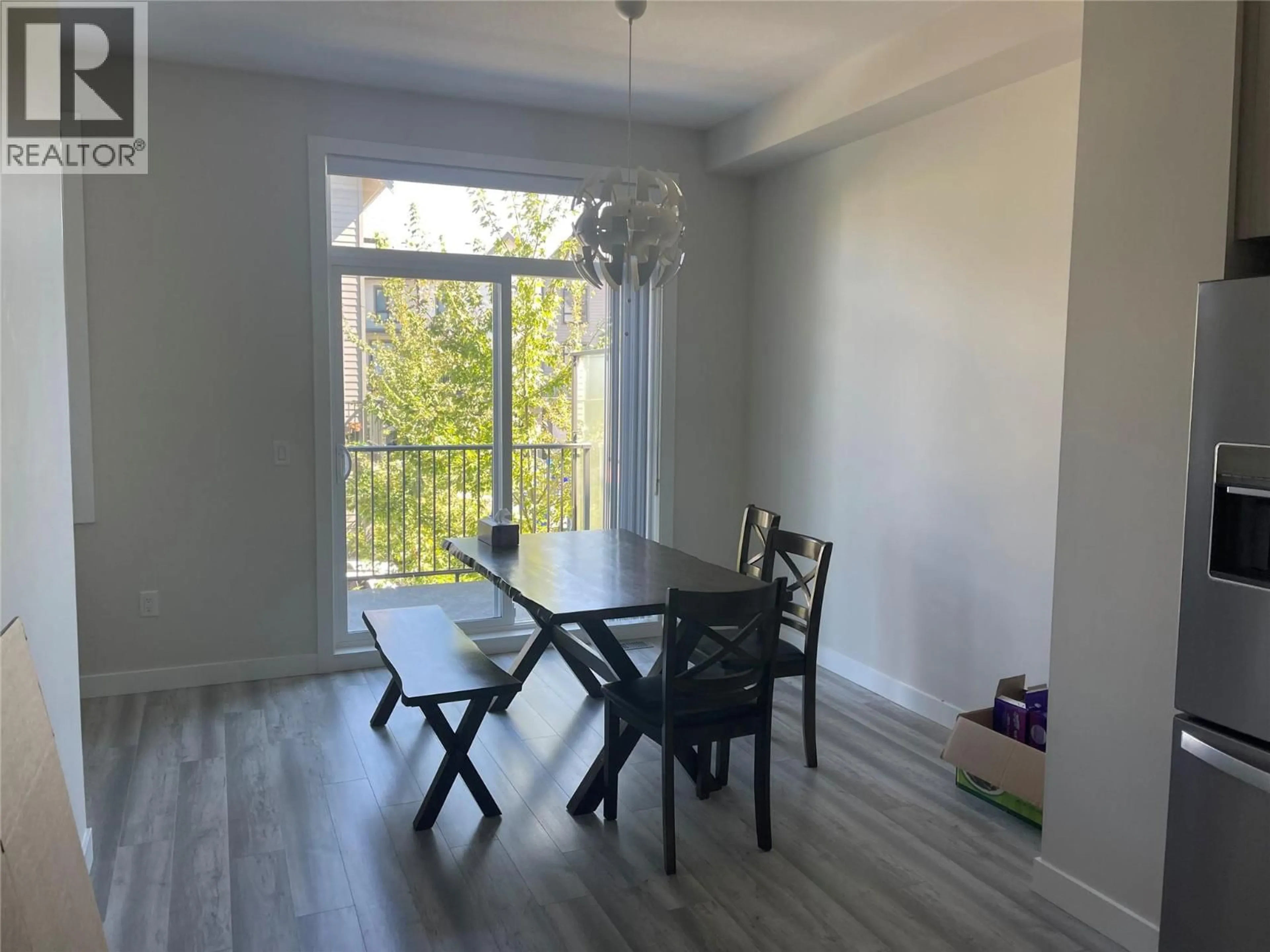Dining room, wood/laminate floor for 20 - 170 CELANO CRESCENT, Kelowna British Columbia V1V0B6