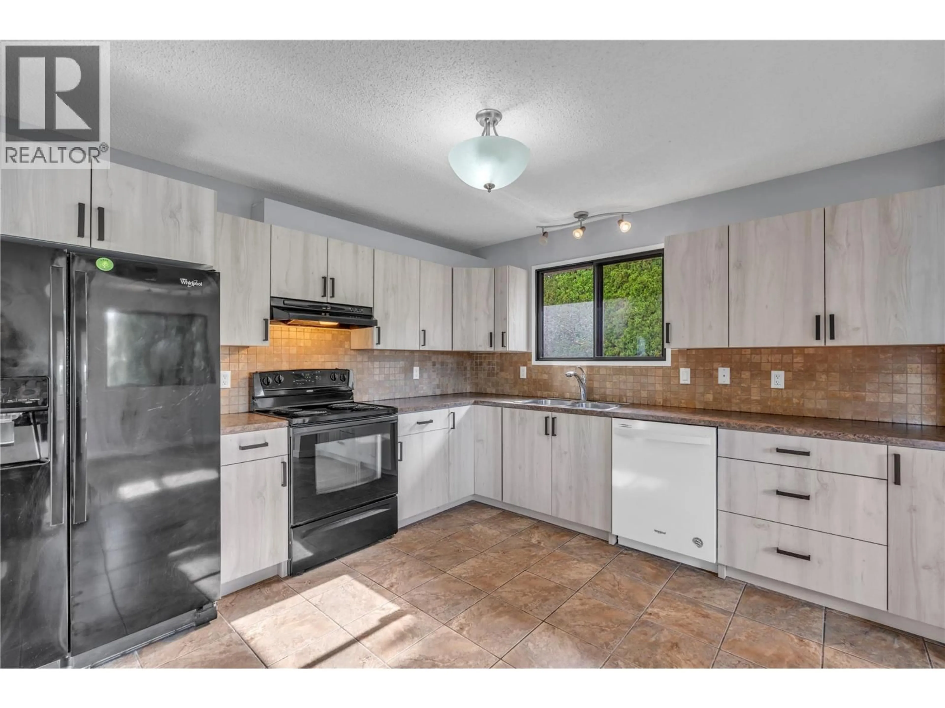 Standard kitchen, ceramic/tile floor for 2550 WILTSE DRIVE, Penticton British Columbia V2A7X5