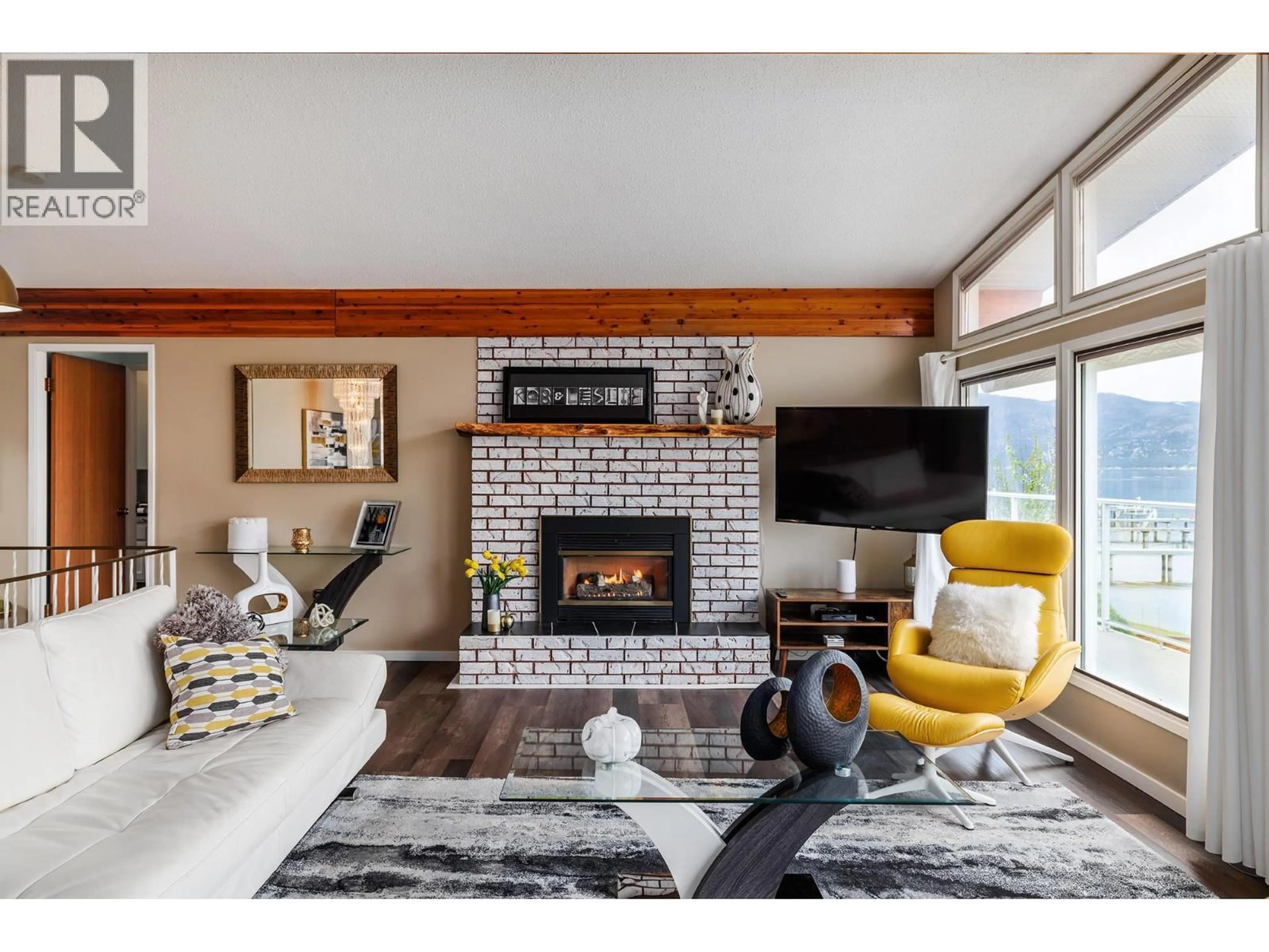 Living room with furniture, unknown for 8291 OKANAGAN LANDING ROAD, Vernon British Columbia V1H1J5