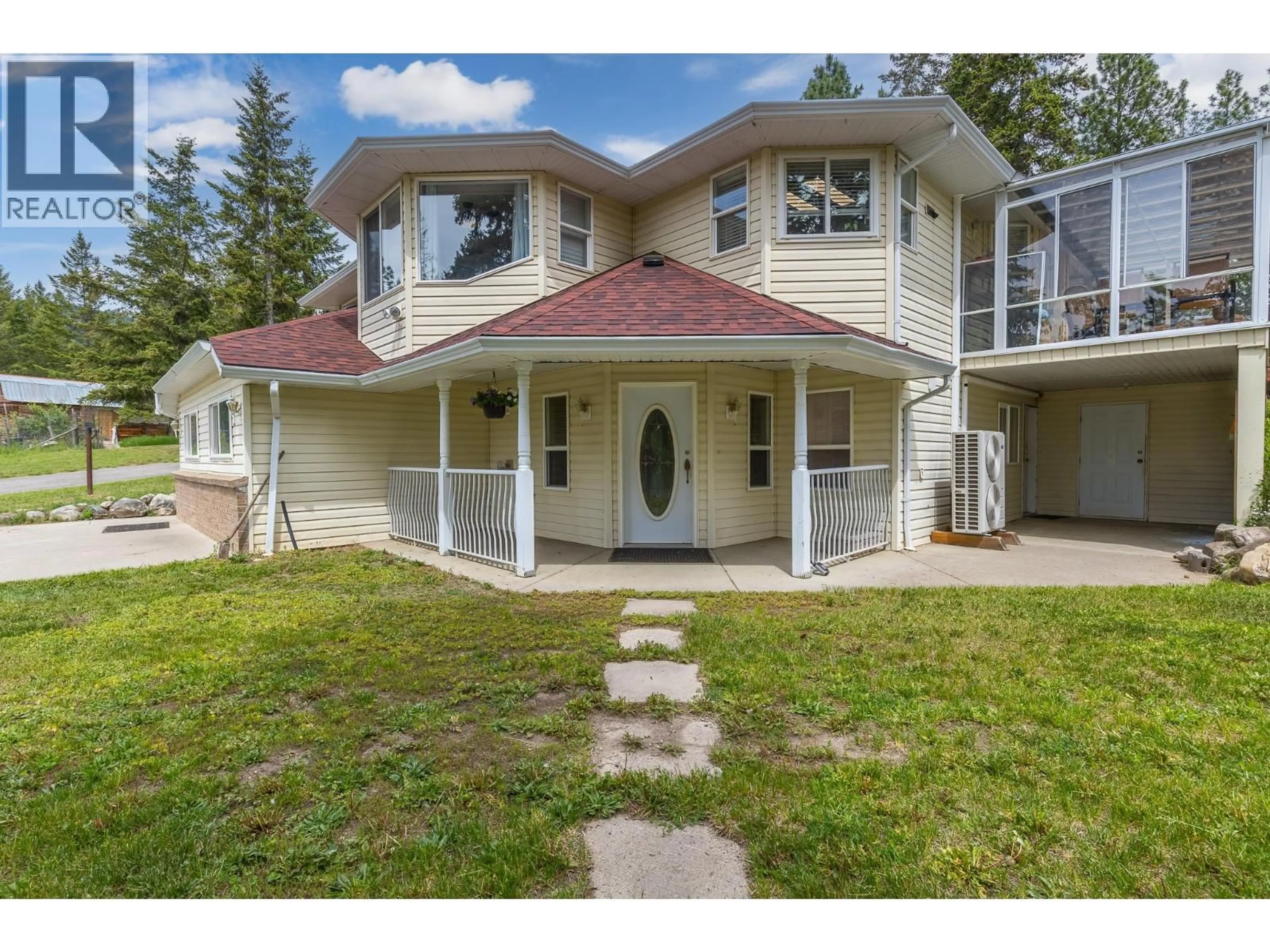 A pic from outside/outdoor area/front of a property/back of a property/a pic from drone, mountain view for 90 MCINNES ROAD, Lumby British Columbia V0E2G1