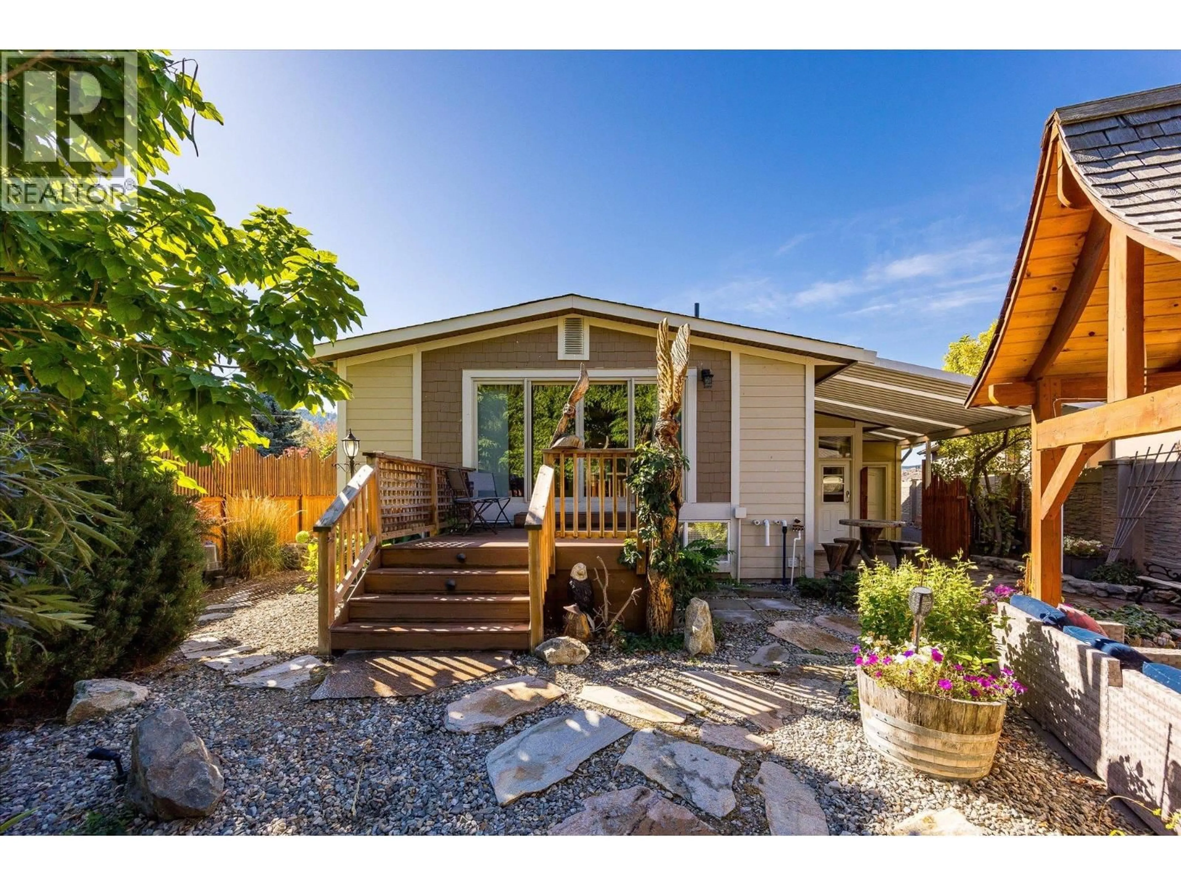 Home with vinyl exterior material, street for 12313 KALAVISTA DRIVE, Coldstream British Columbia V1B1K7