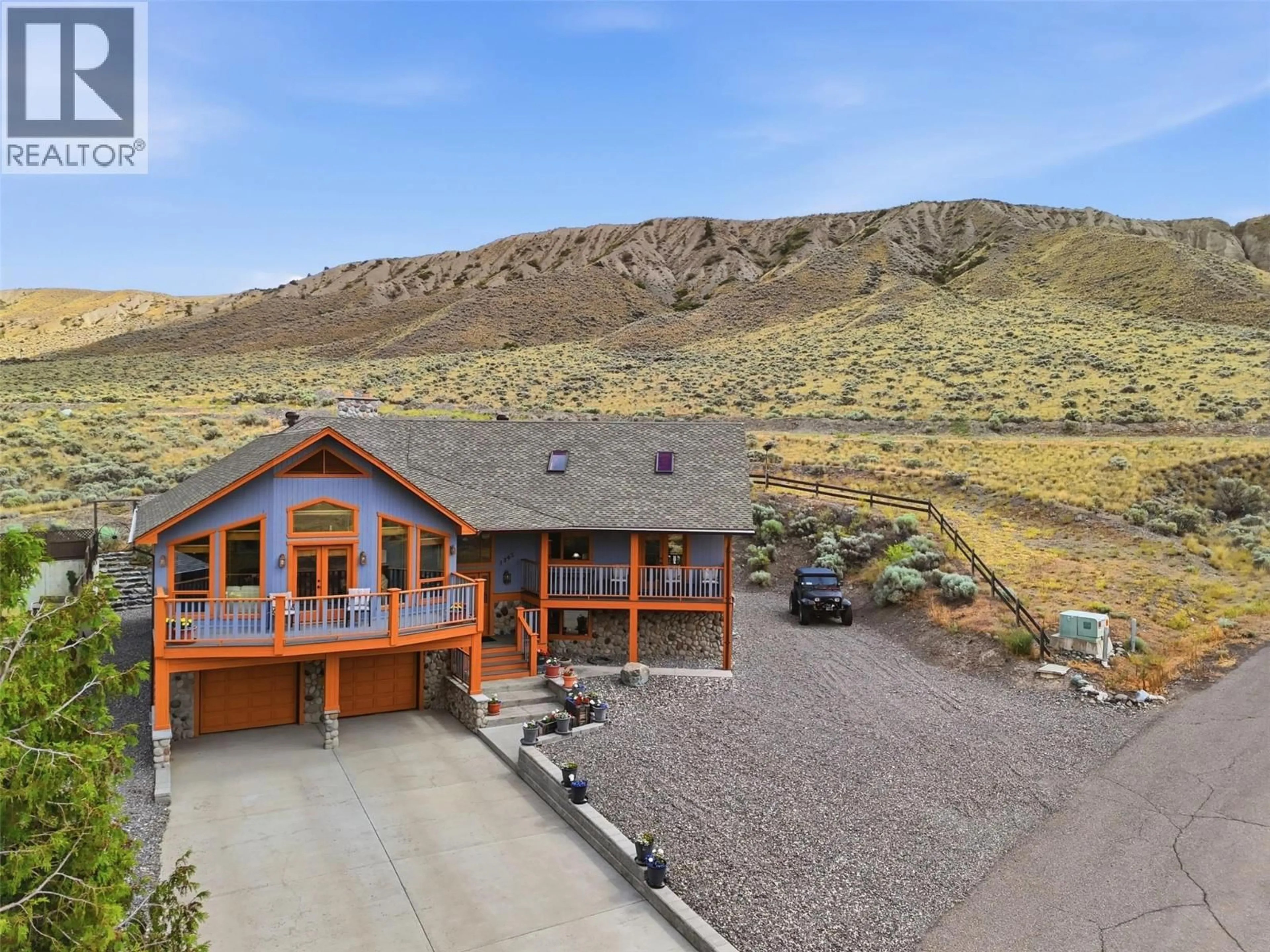 A pic from outside/outdoor area/front of a property/back of a property/a pic from drone, mountain view for 1345 HEUSTIS DRIVE, Kamloops British Columbia V0K1A0