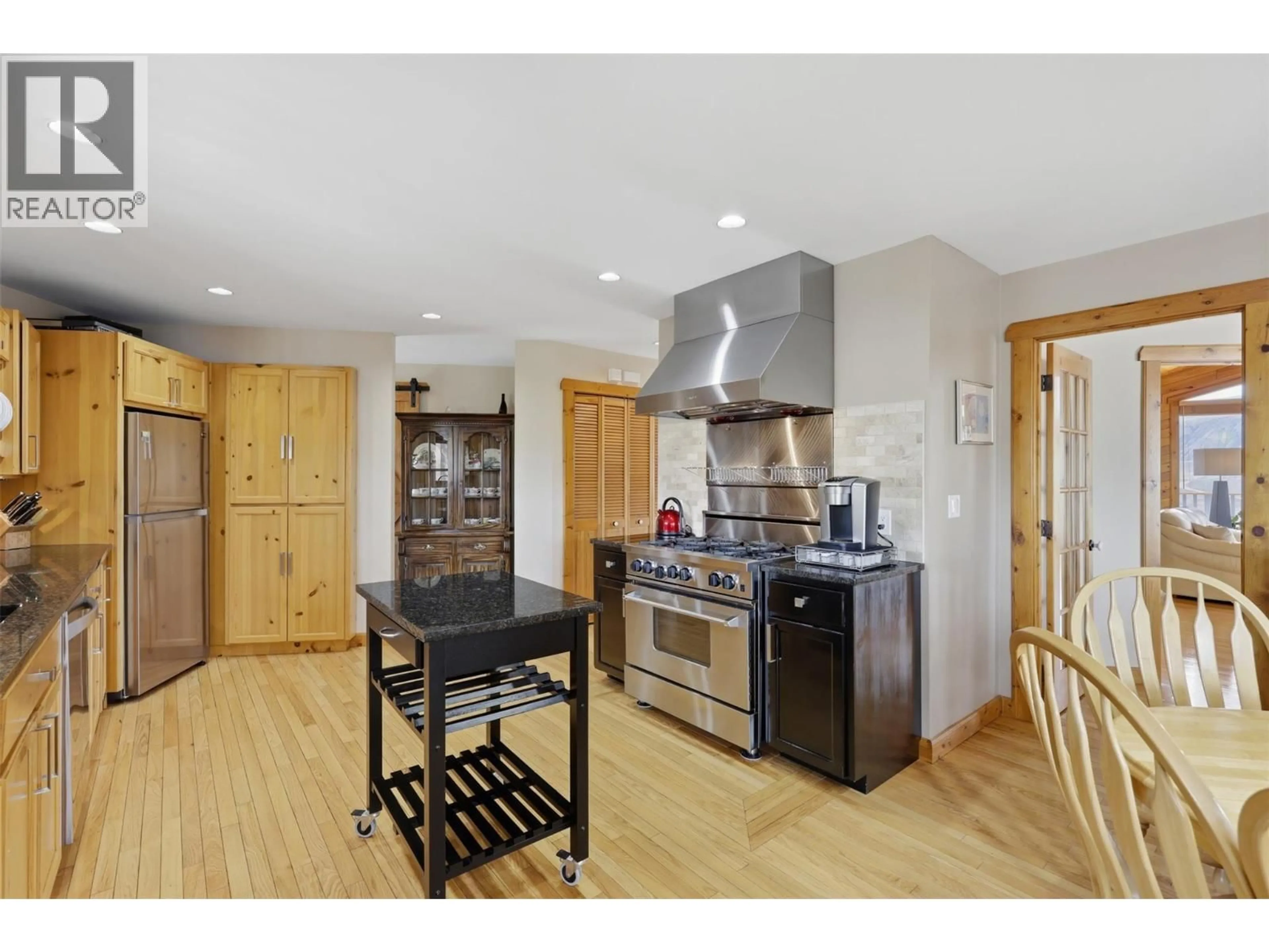 Open concept kitchen, wood/laminate floor for 1345 HEUSTIS DRIVE, Kamloops British Columbia V0K1A0