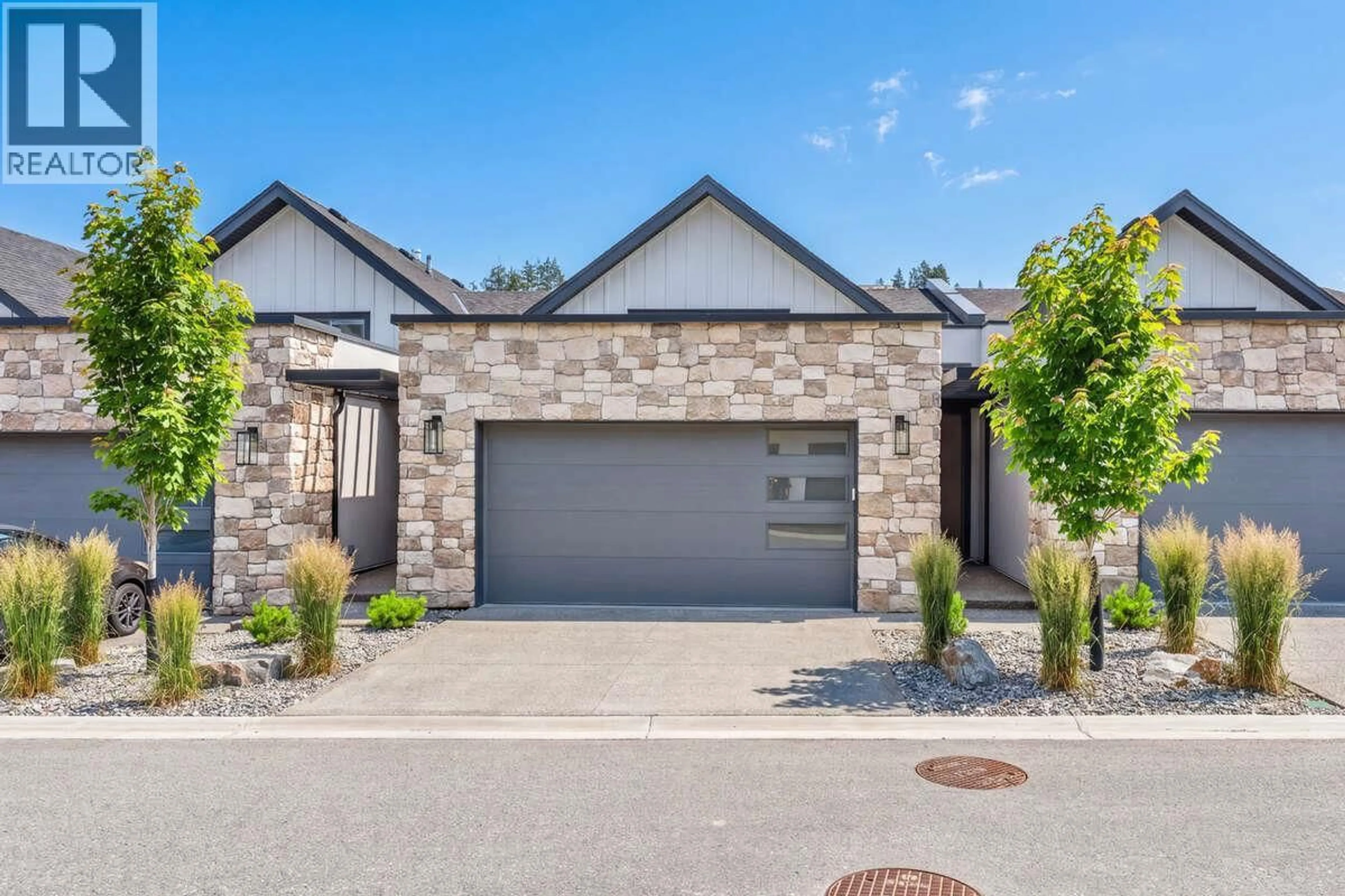 Home with brick exterior material, street for 48 - 1550 UNION ROAD, Kelowna British Columbia V1V0G9