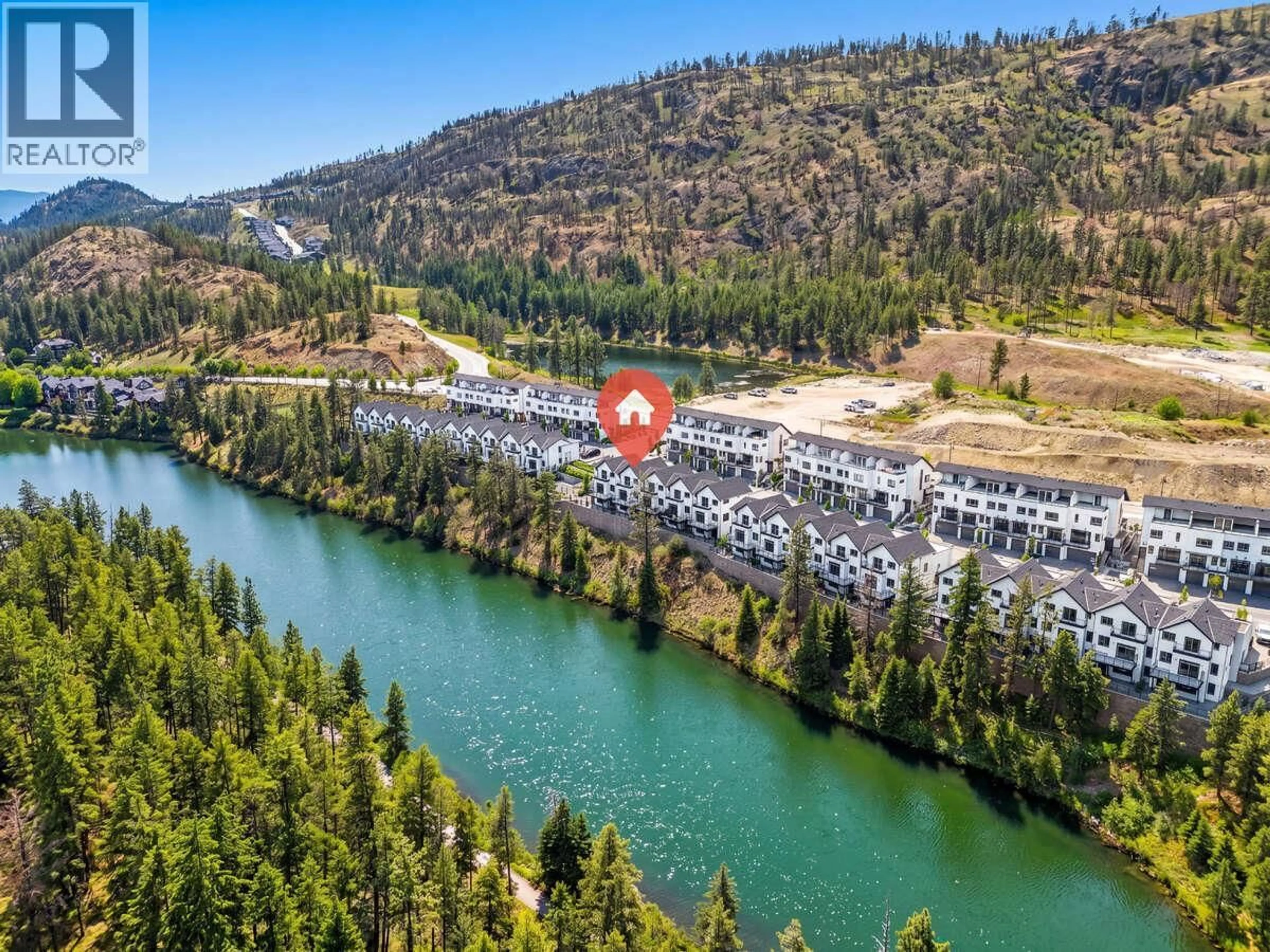 A pic from outside/outdoor area/front of a property/back of a property/a pic from drone, water/lake/river/ocean view for 48 - 1550 UNION ROAD, Kelowna British Columbia V1V0G9