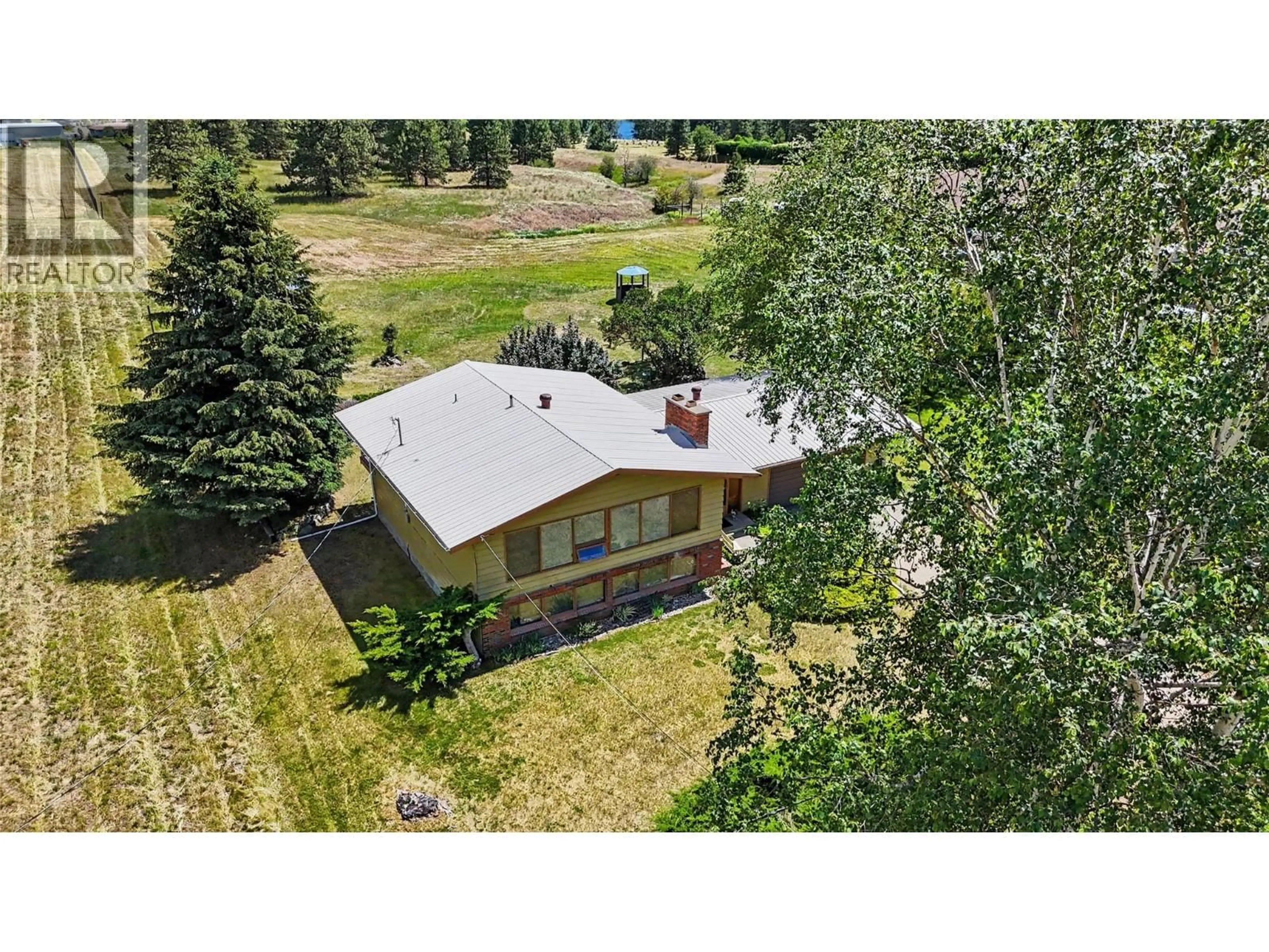 A pic from outside/outdoor area/front of a property/back of a property/a pic from drone, unknown for 6030 TOWER ROAD, Grand Forks British Columbia V0H1H5