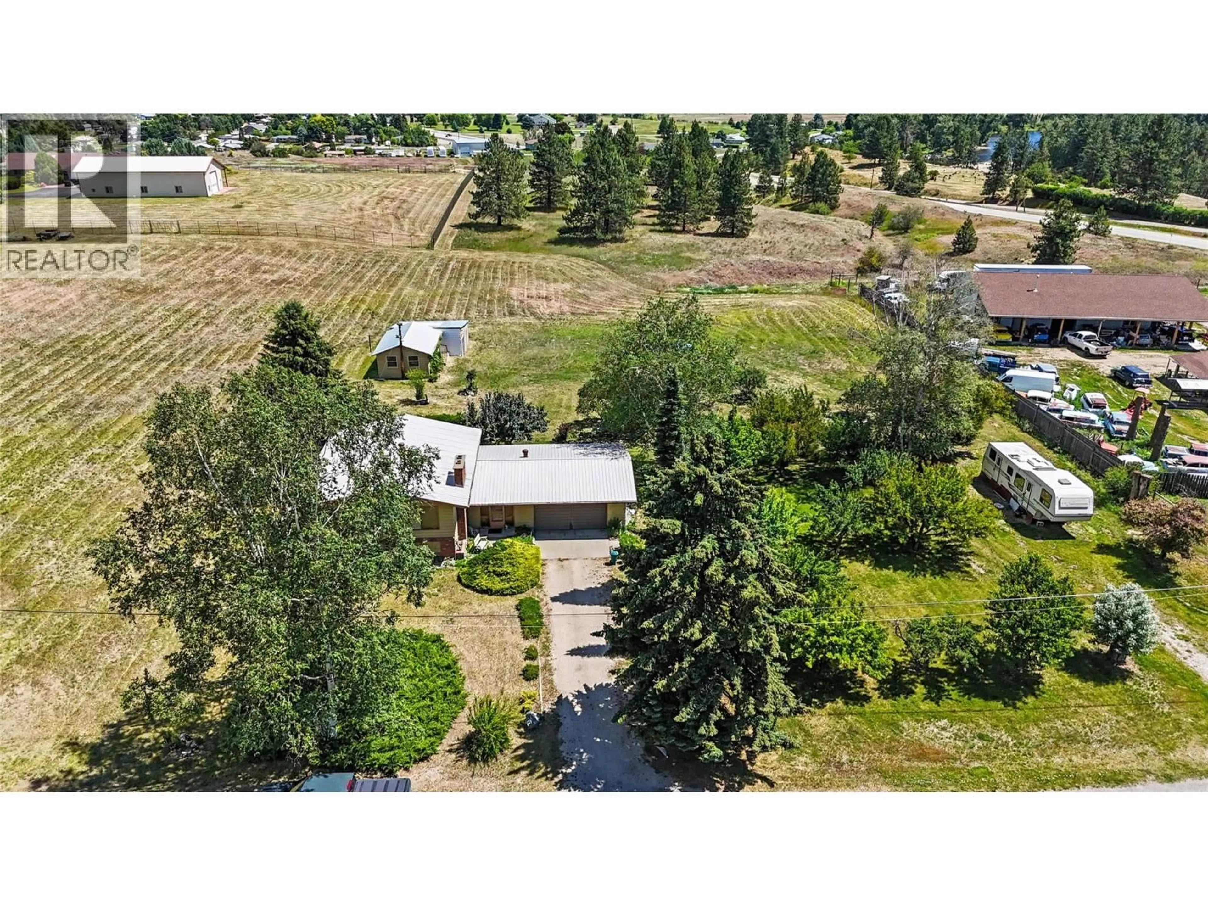 A pic from outside/outdoor area/front of a property/back of a property/a pic from drone, unknown for 6030 TOWER ROAD, Grand Forks British Columbia V0H1H5