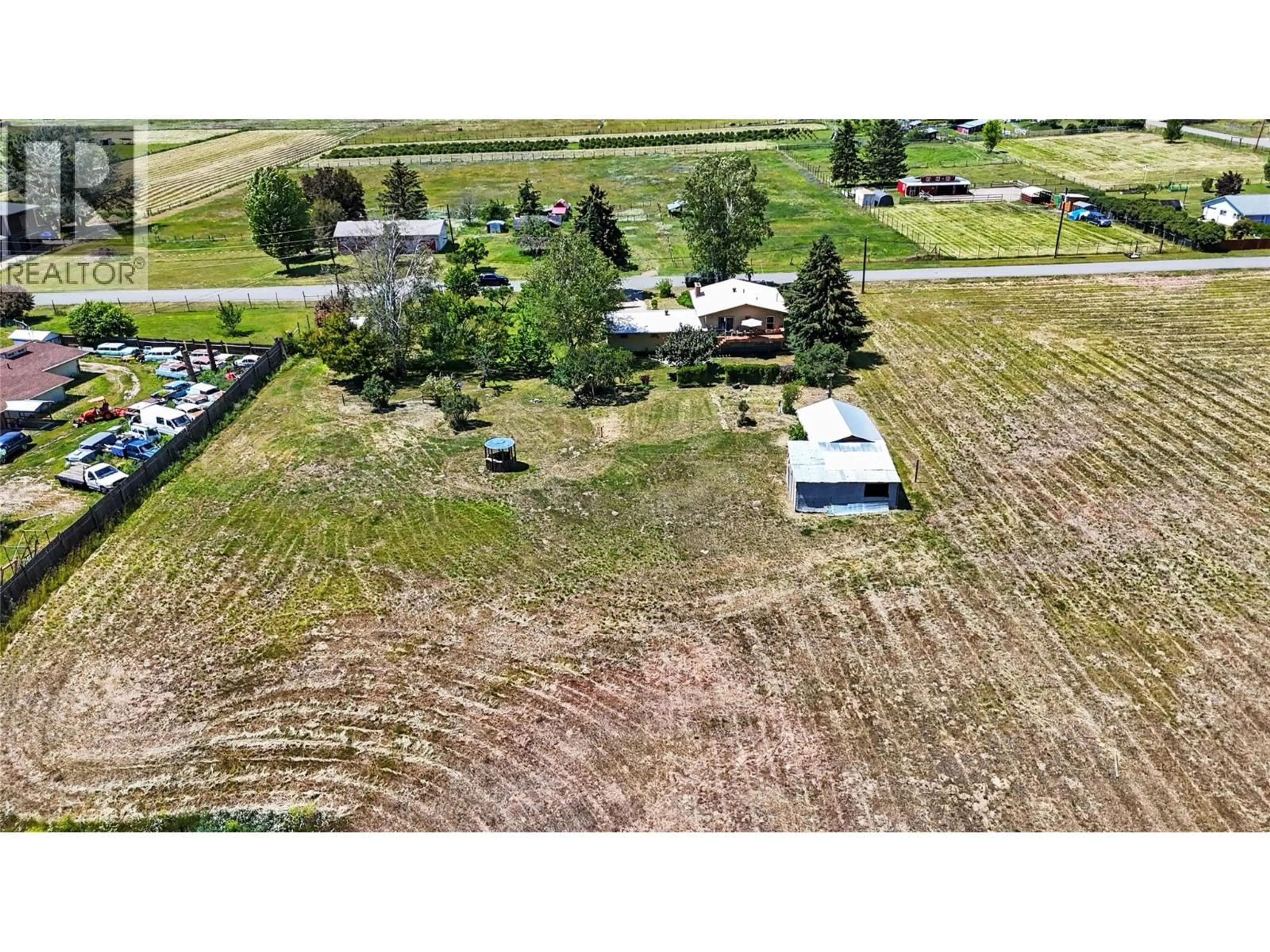 A pic from outside/outdoor area/front of a property/back of a property/a pic from drone, unknown for 6030 TOWER ROAD, Grand Forks British Columbia V0H1H5