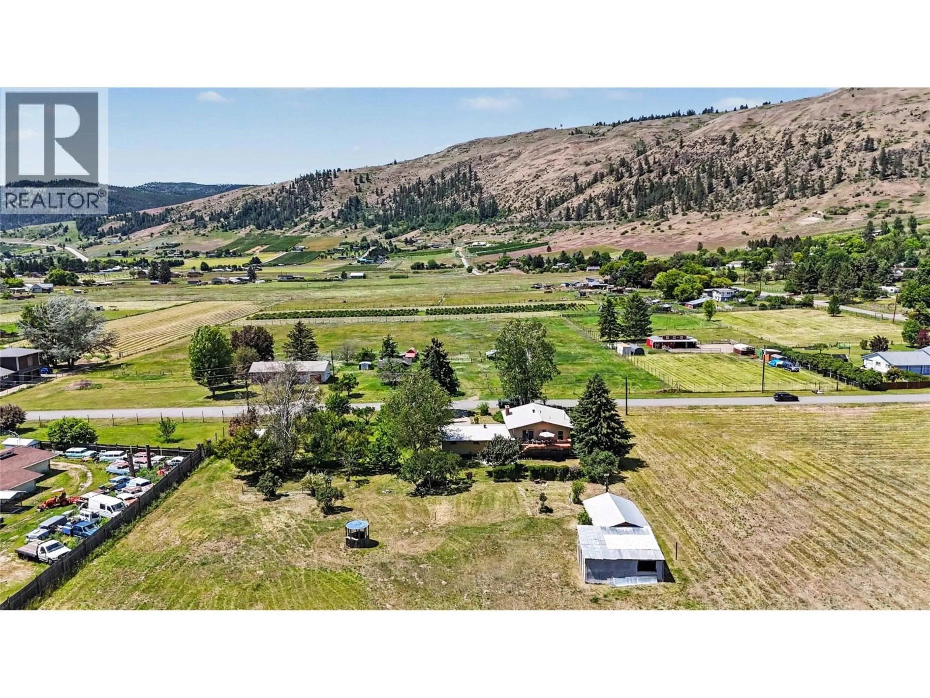 A pic from outside/outdoor area/front of a property/back of a property/a pic from drone, mountain view for 6030 TOWER ROAD, Grand Forks British Columbia V0H1H5