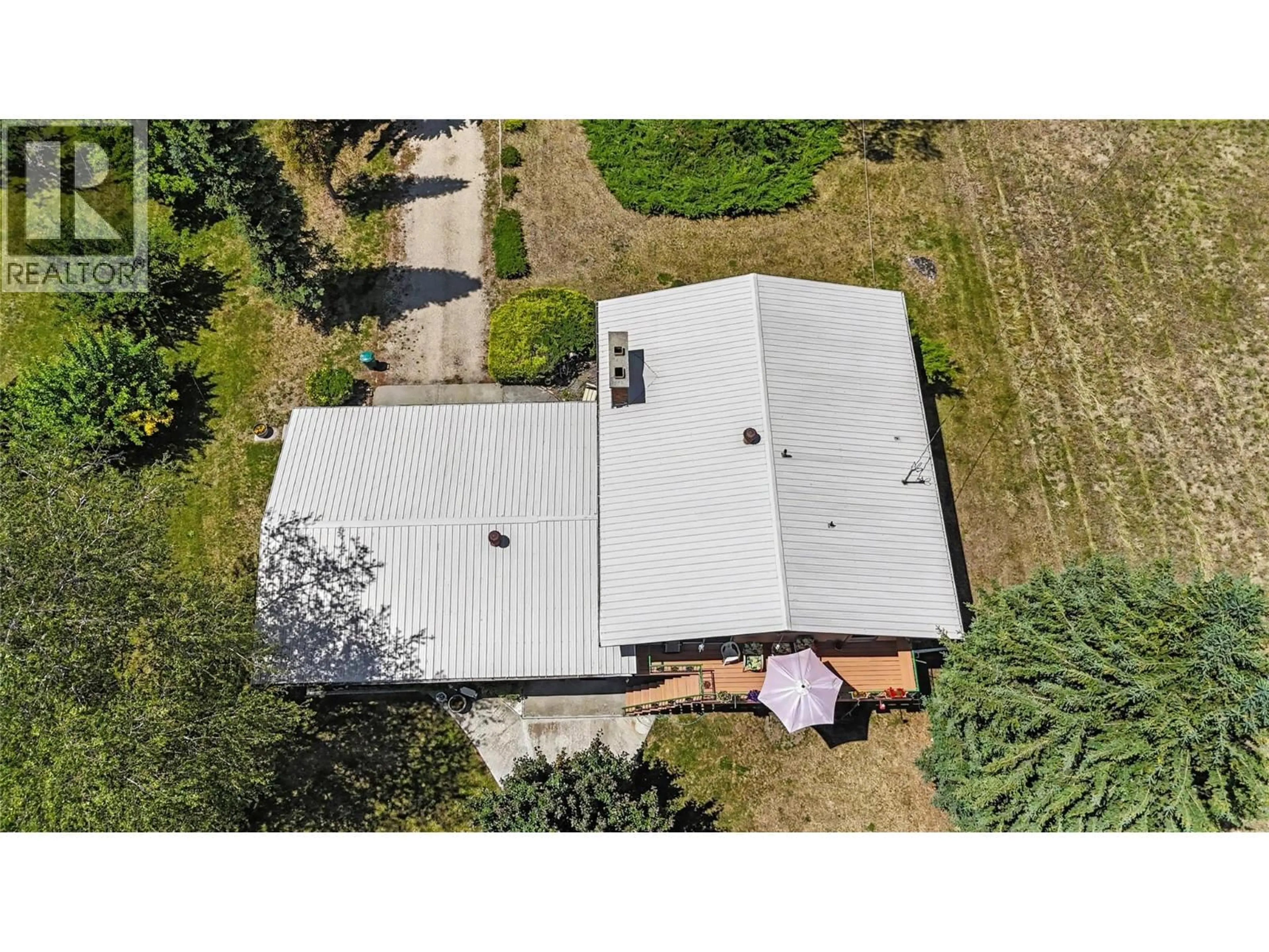 A pic from outside/outdoor area/front of a property/back of a property/a pic from drone, building for 6030 TOWER ROAD, Grand Forks British Columbia V0H1H5