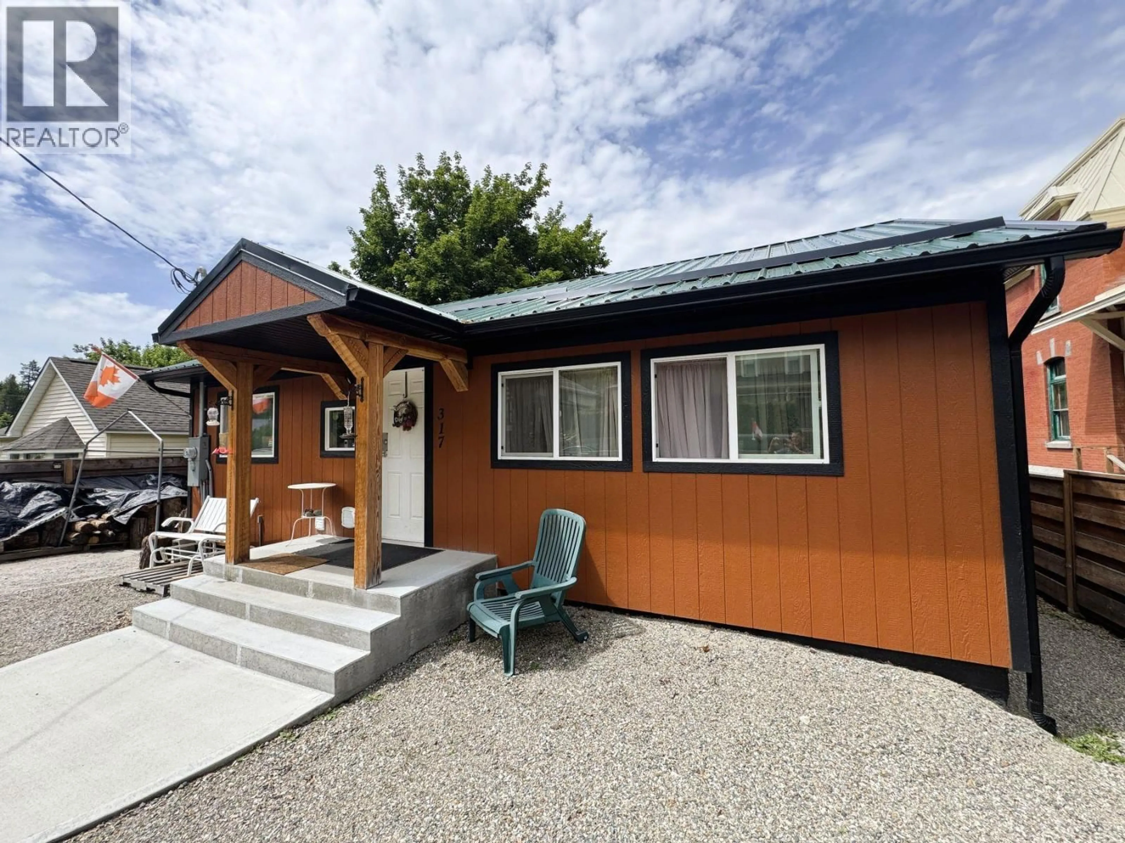 Home with vinyl exterior material, street for 317 SOUTH GOVERNMENT AVENUE, Greenwood British Columbia V0H1J0