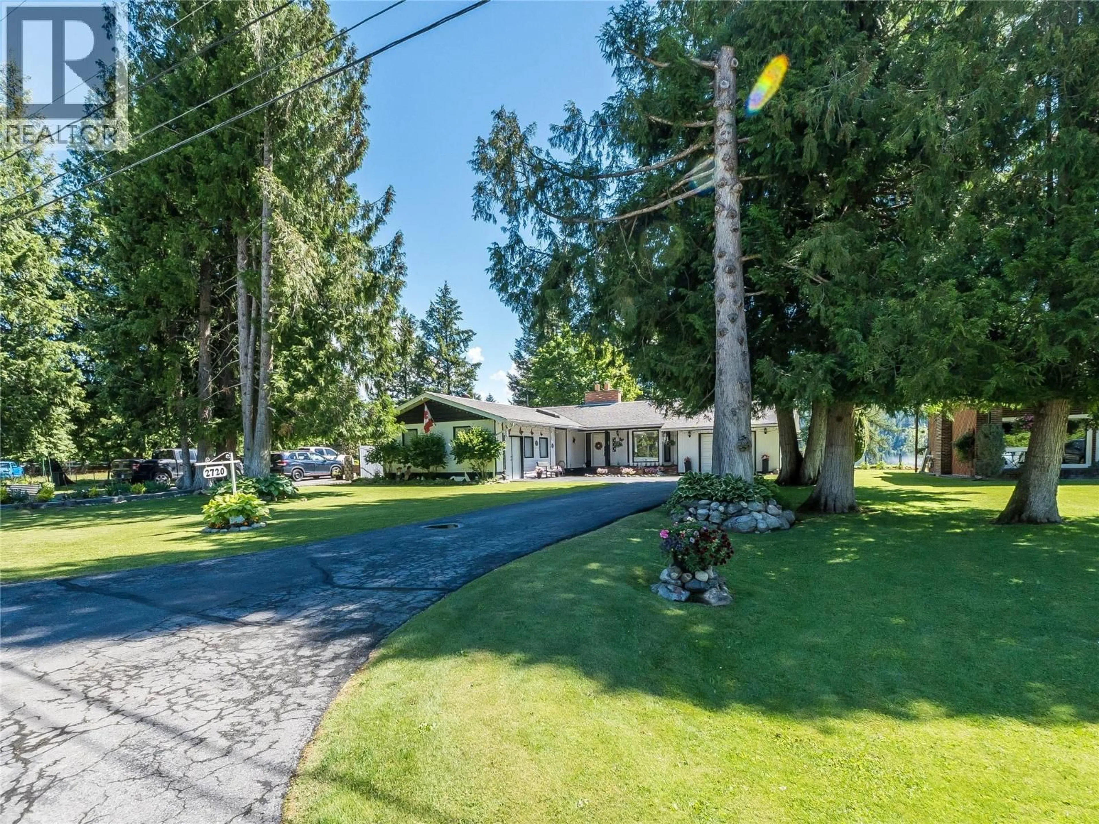 A pic from outside/outdoor area/front of a property/back of a property/a pic from drone, street for 2720 JACKS CRESCENT, South Slocan British Columbia V0G2G1