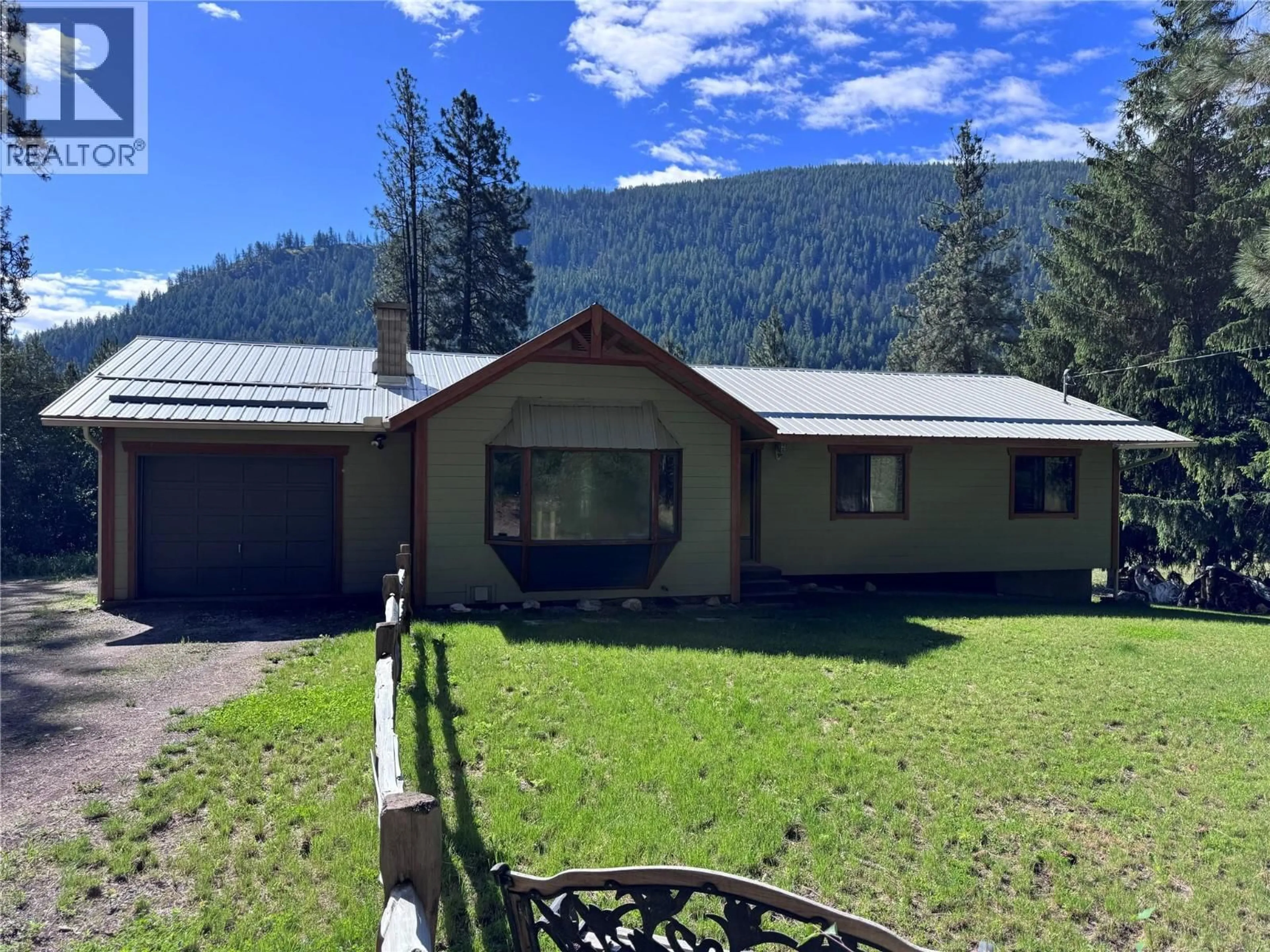 A pic from outside/outdoor area/front of a property/back of a property/a pic from drone, mountain view for 725 3 HIGHWAY, Cascade British Columbia V0H1E0