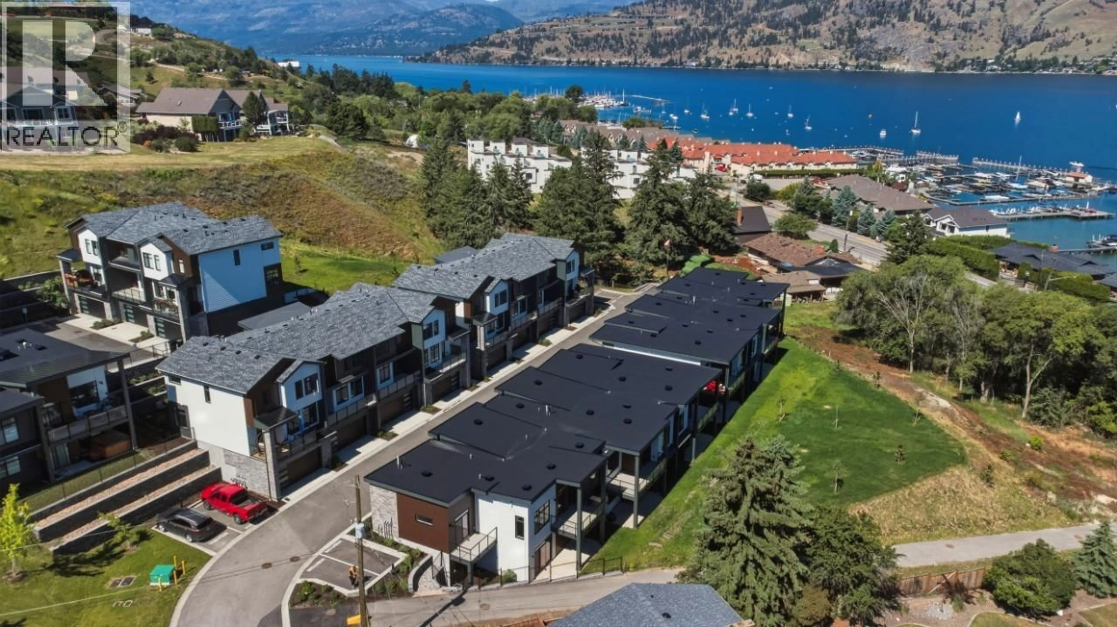 A pic from outside/outdoor area/front of a property/back of a property/a pic from drone, water/lake/river/ocean view for 29 - 7599 KLINGER ROAD, Okanagan Landing British Columbia V1H0B2