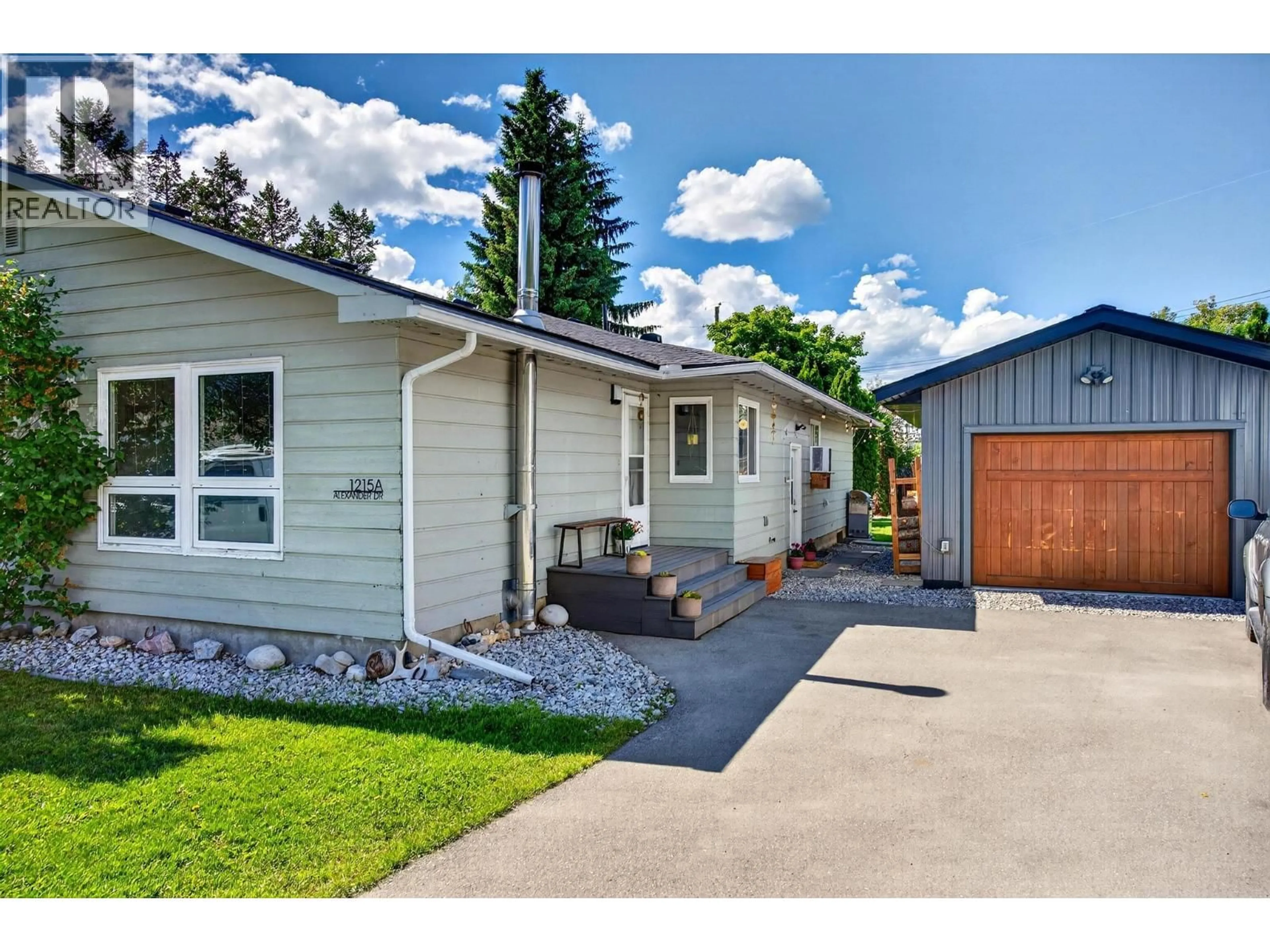 Home with vinyl exterior material, street for A-1215 ALEXANDER DRIVE, Golden British Columbia V0A1H0
