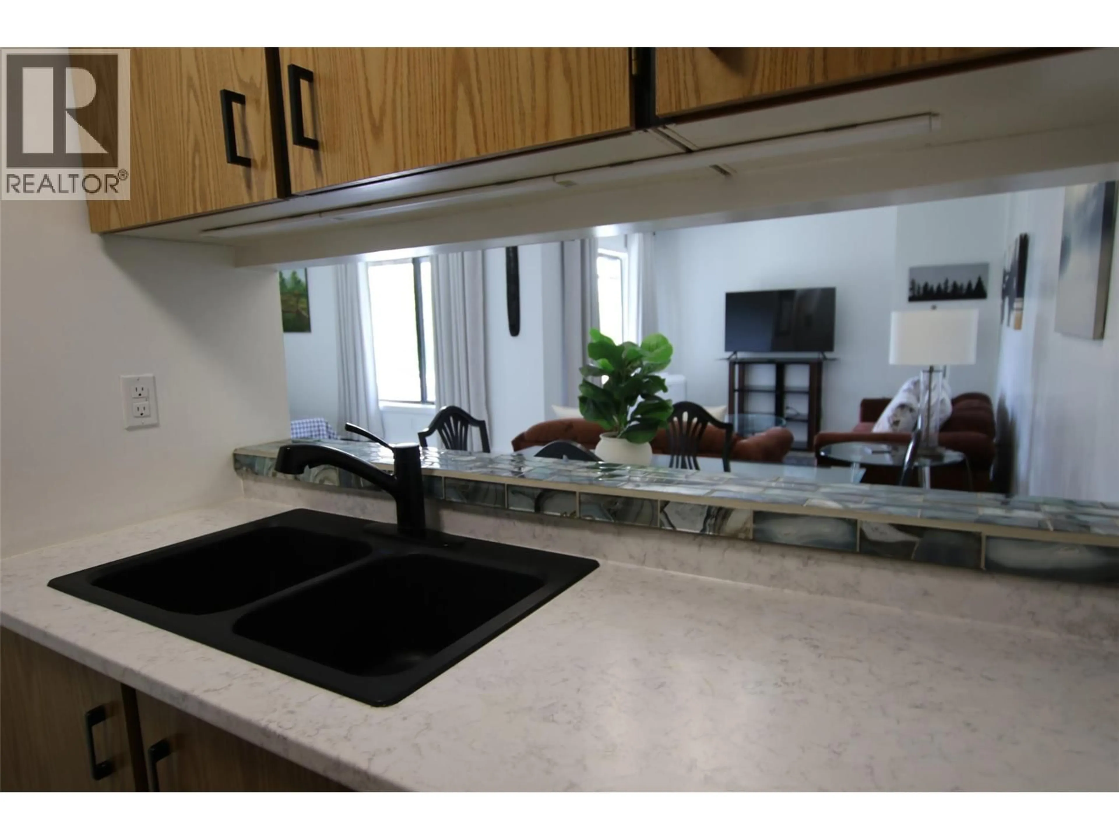 Open concept kitchen, unknown for 310 - 185 CHAMBERLAIN CRESCENT, Tumbler Ridge British Columbia V0C2W0