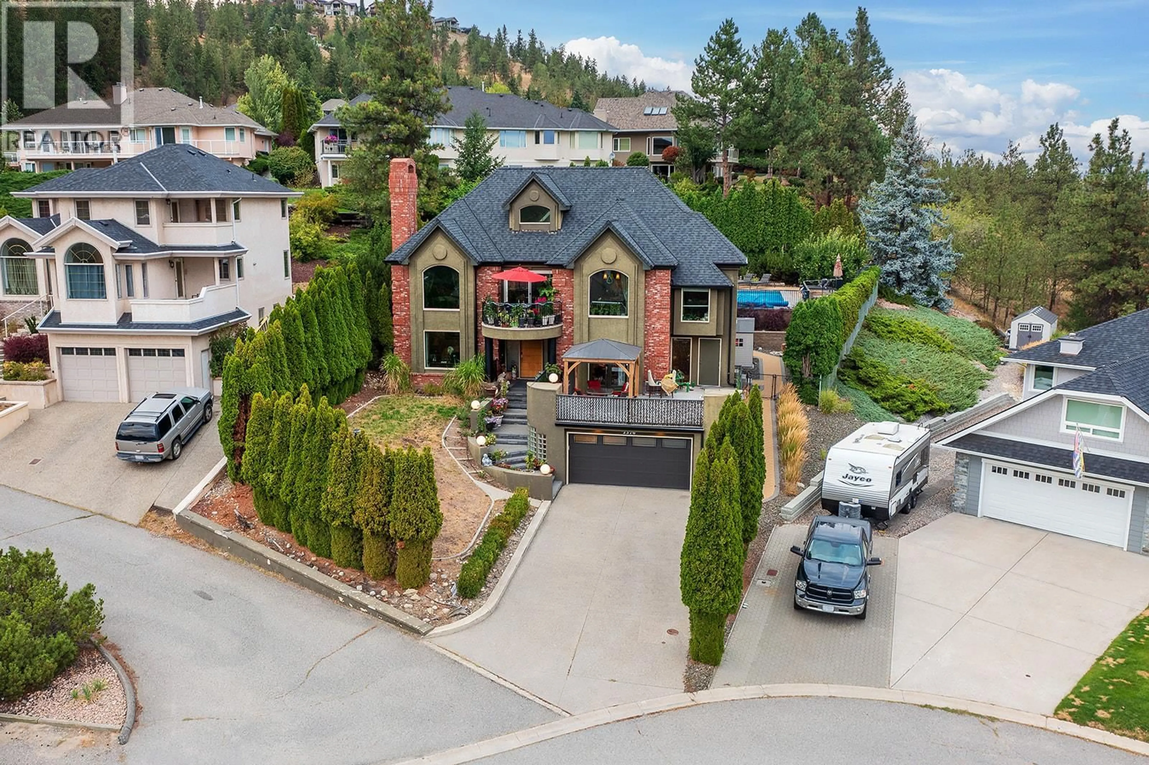A pic from outside/outdoor area/front of a property/back of a property/a pic from drone, mountain view for 2376 NAHANNI COURT, Kelowna British Columbia V1V1N1