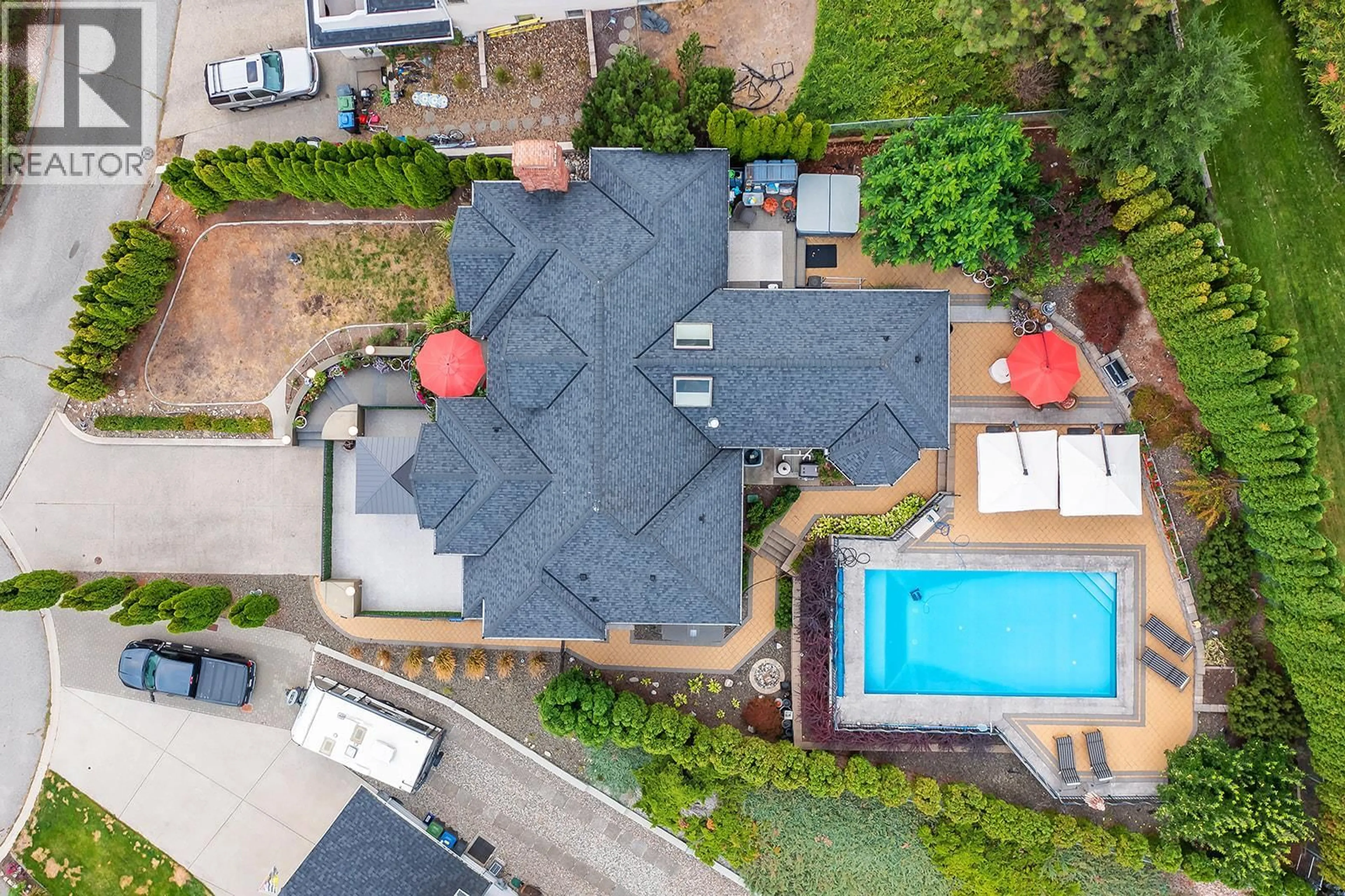A pic from outside/outdoor area/front of a property/back of a property/a pic from drone, unknown for 2376 NAHANNI COURT, Kelowna British Columbia V1V1N1