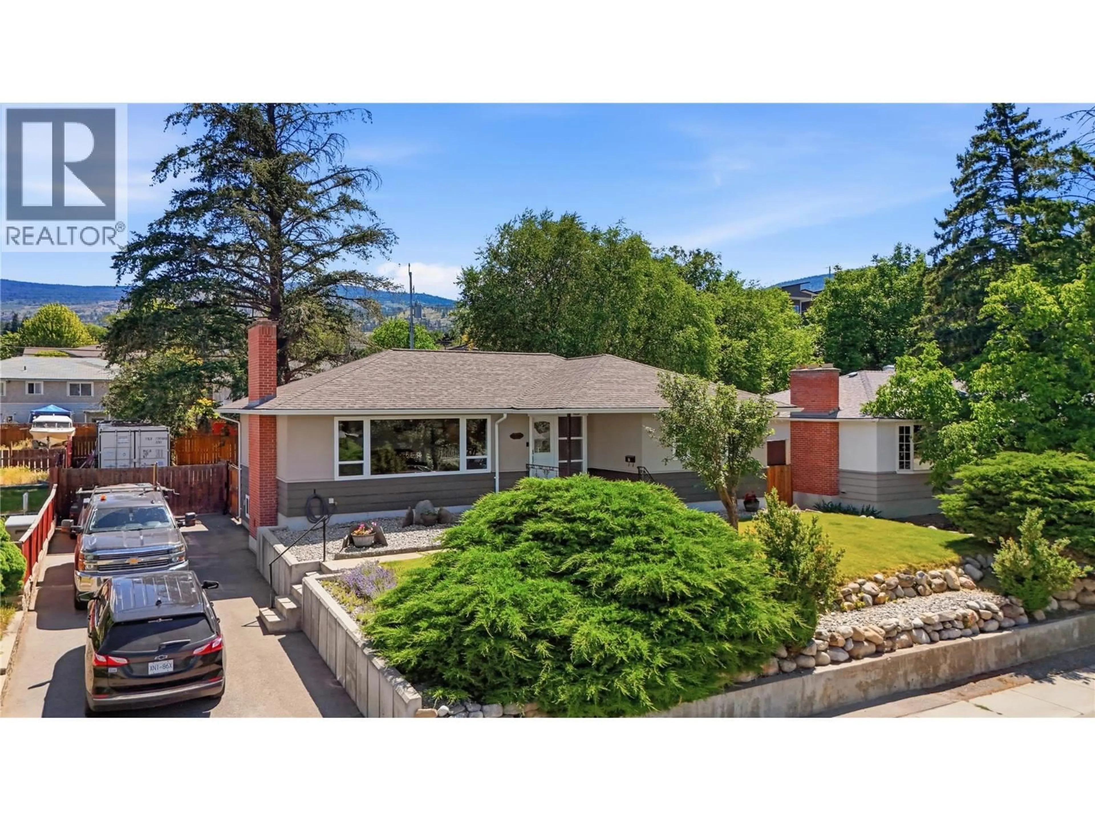 A pic from outside/outdoor area/front of a property/back of a property/a pic from drone, mountain view for 1428 BALFOUR STREET, Penticton British Columbia V2A4Z1