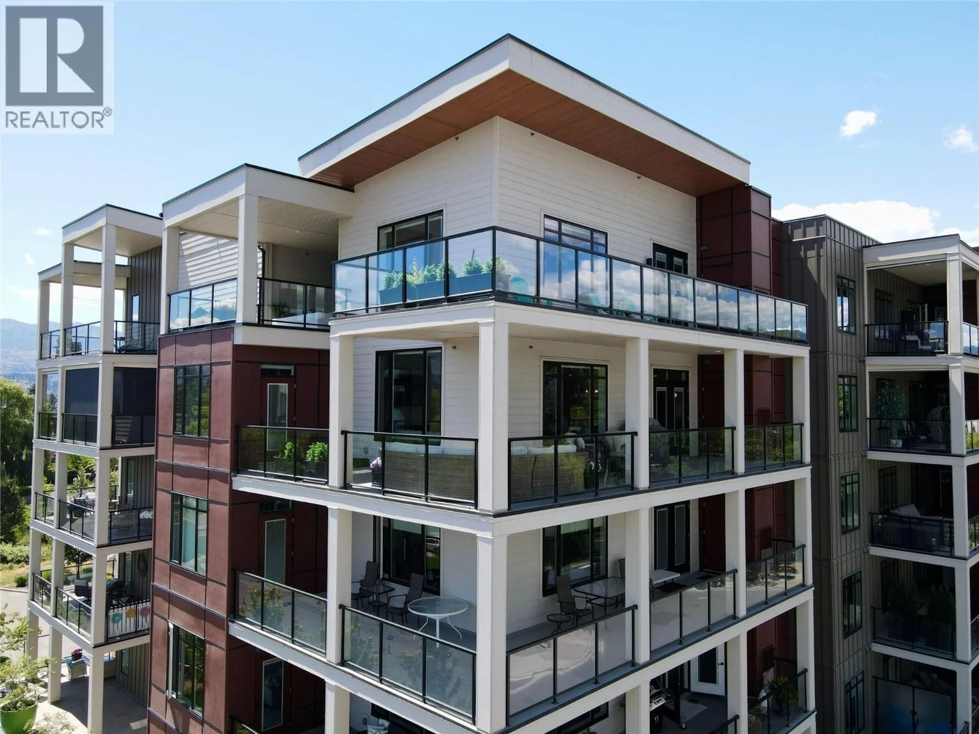 Balcony in the apartment, city buildings view from balcony for 503 - 529 TRUSWELL ROAD, Kelowna British Columbia V1W3K7