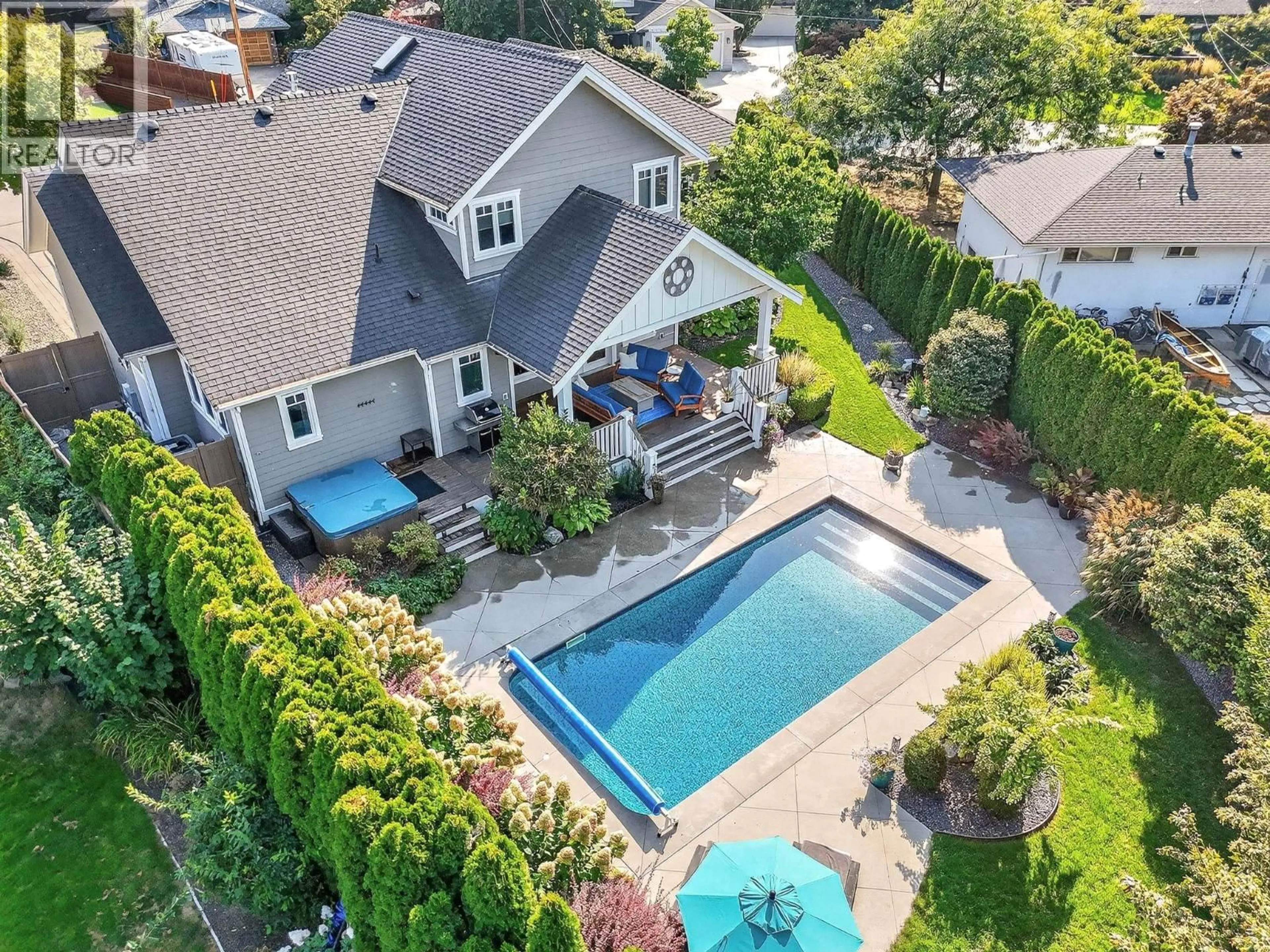 A pic from outside/outdoor area/front of a property/back of a property/a pic from drone, unknown for 440 HOBSON CRESCENT, Kelowna British Columbia V1W1Y5