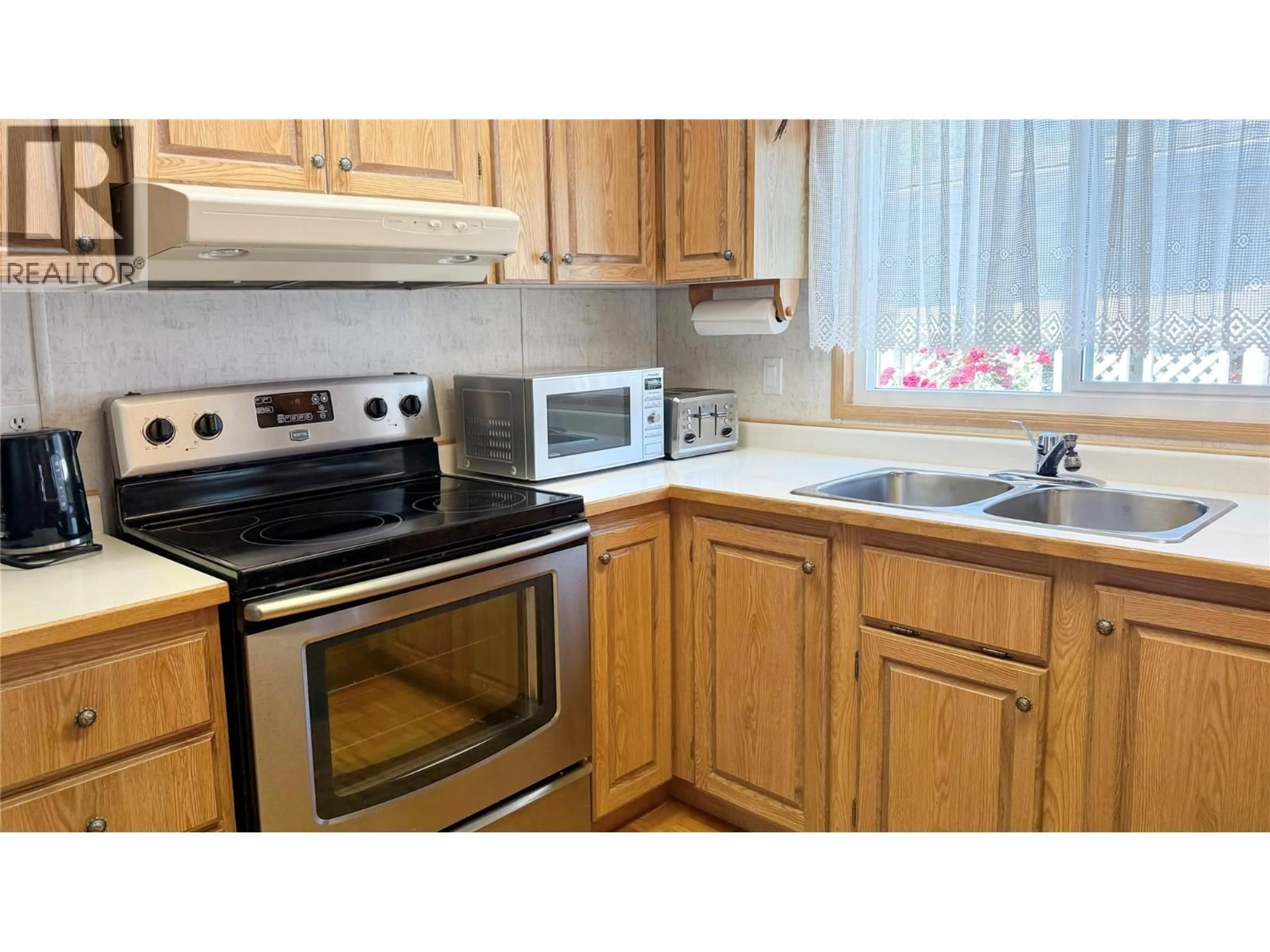 Standard kitchen, wood/laminate floor for 56 - 1850 SHANNON LAKE ROAD, West Kelowna British Columbia V4T1L6