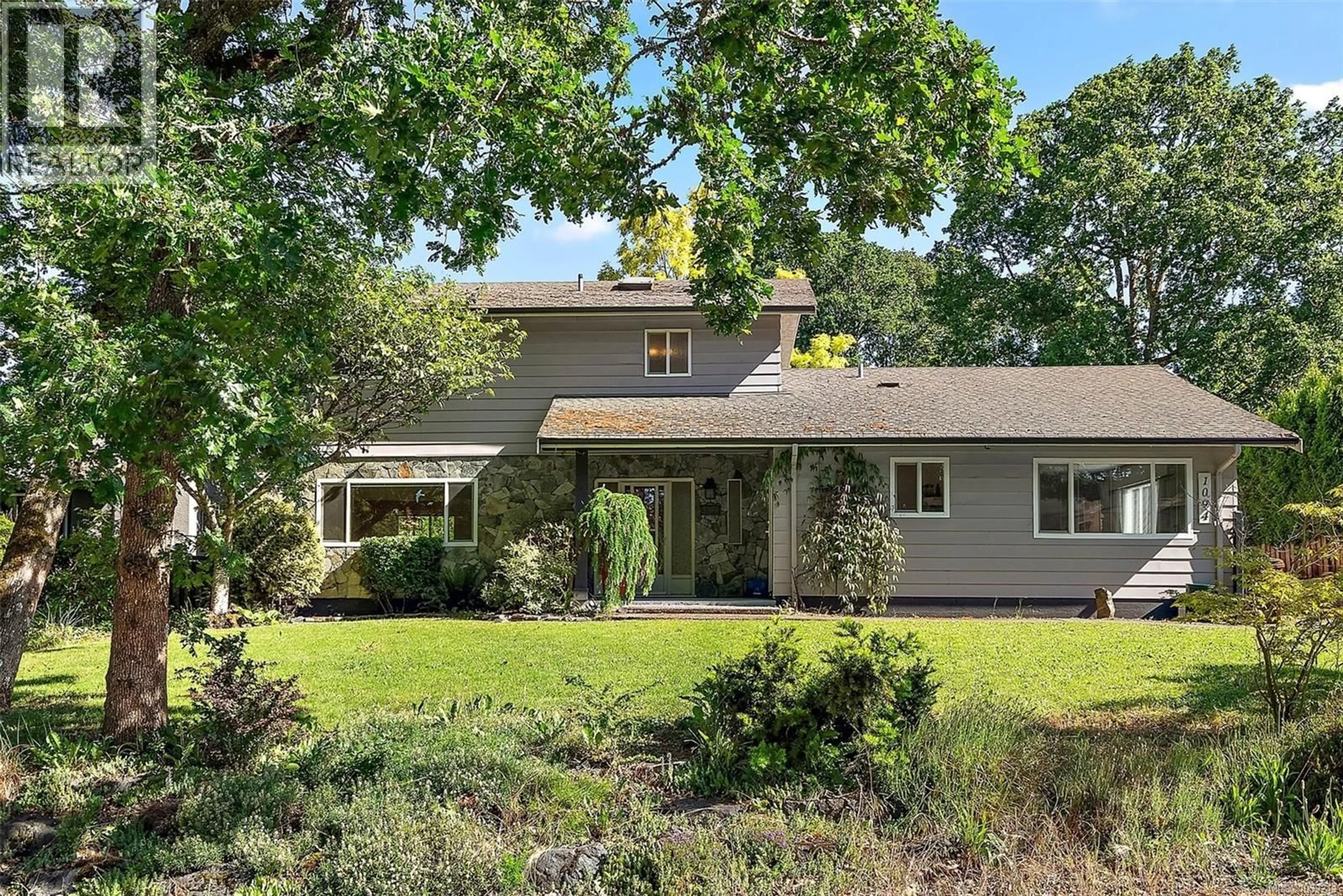 A pic from outside/outdoor area/front of a property/back of a property/a pic from drone, street for 1094 SLUGGETT ROAD, Central Saanich British Columbia V8M1J1